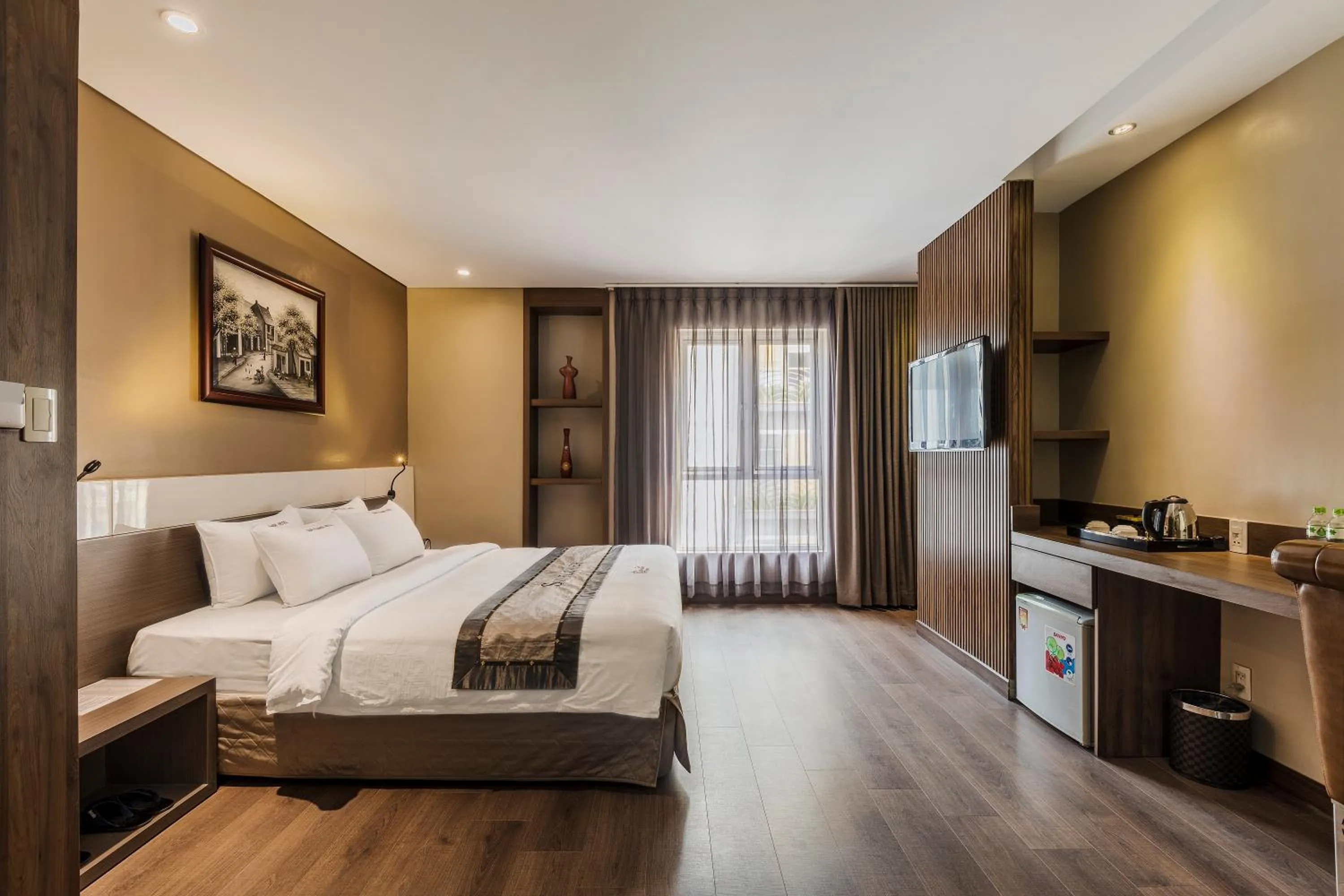 Bed in Sunflower Luxury Hotel