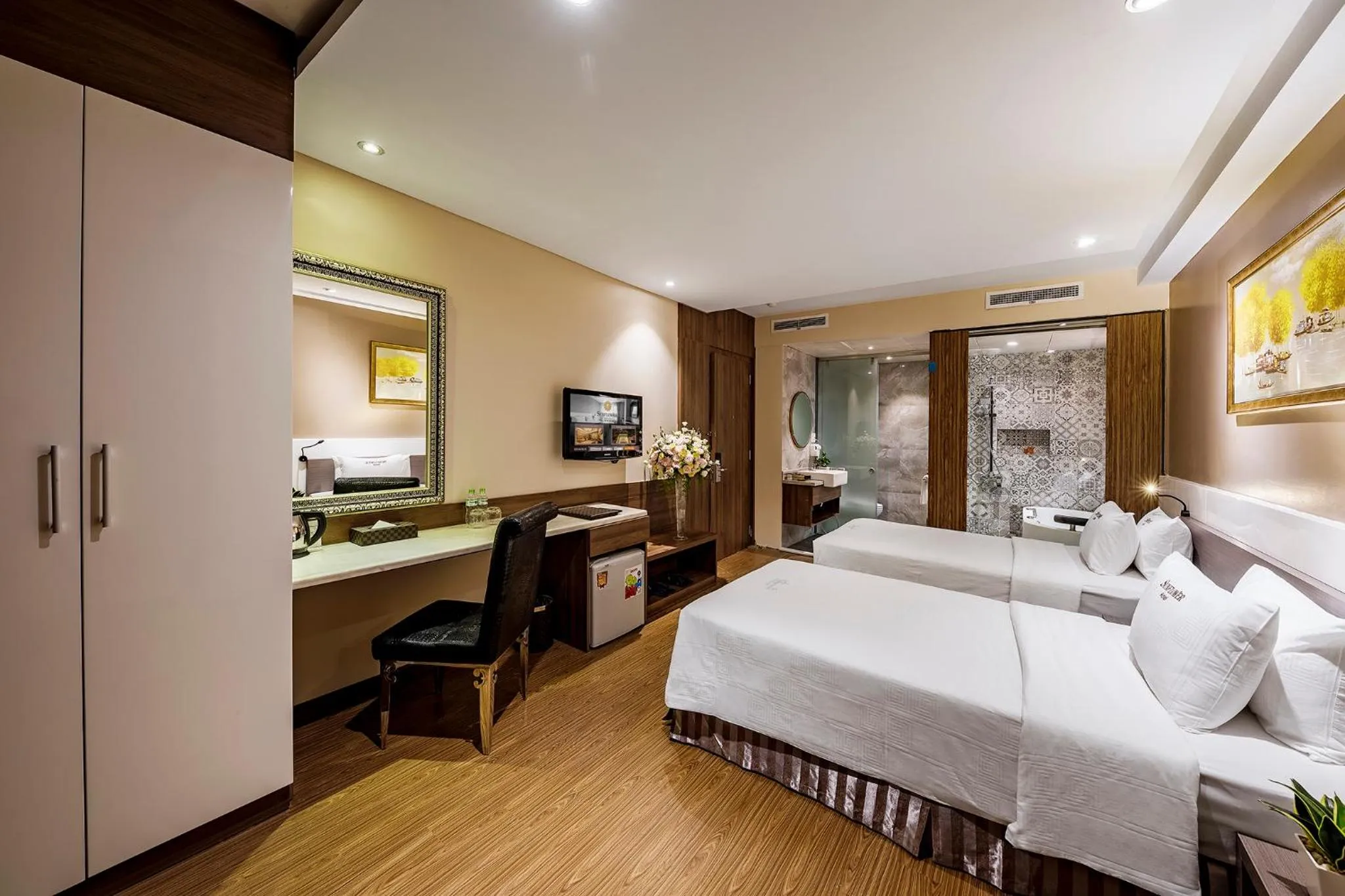 Bed in Sunflower Luxury Hotel