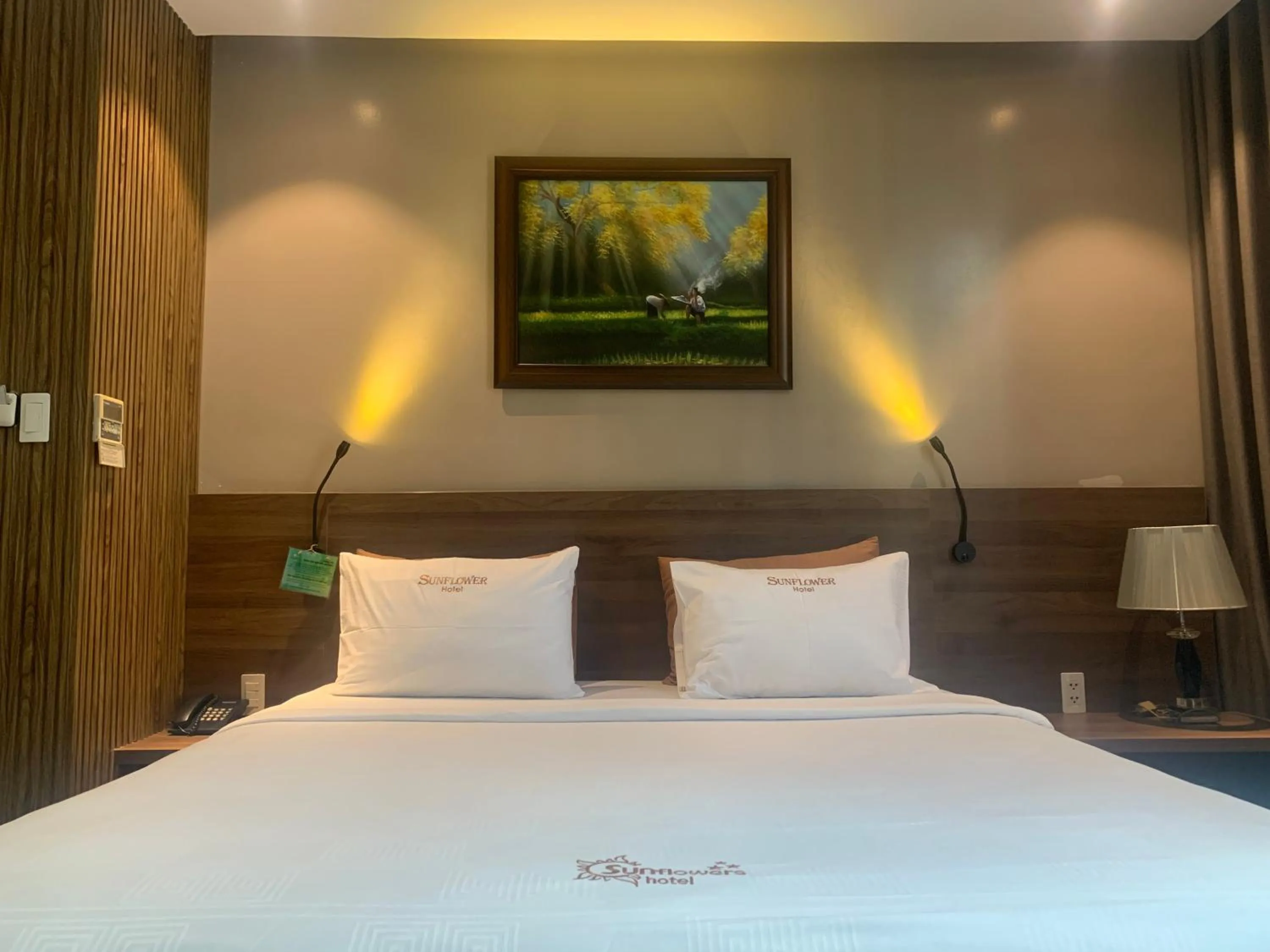 Bed in Sunflower Luxury Hotel