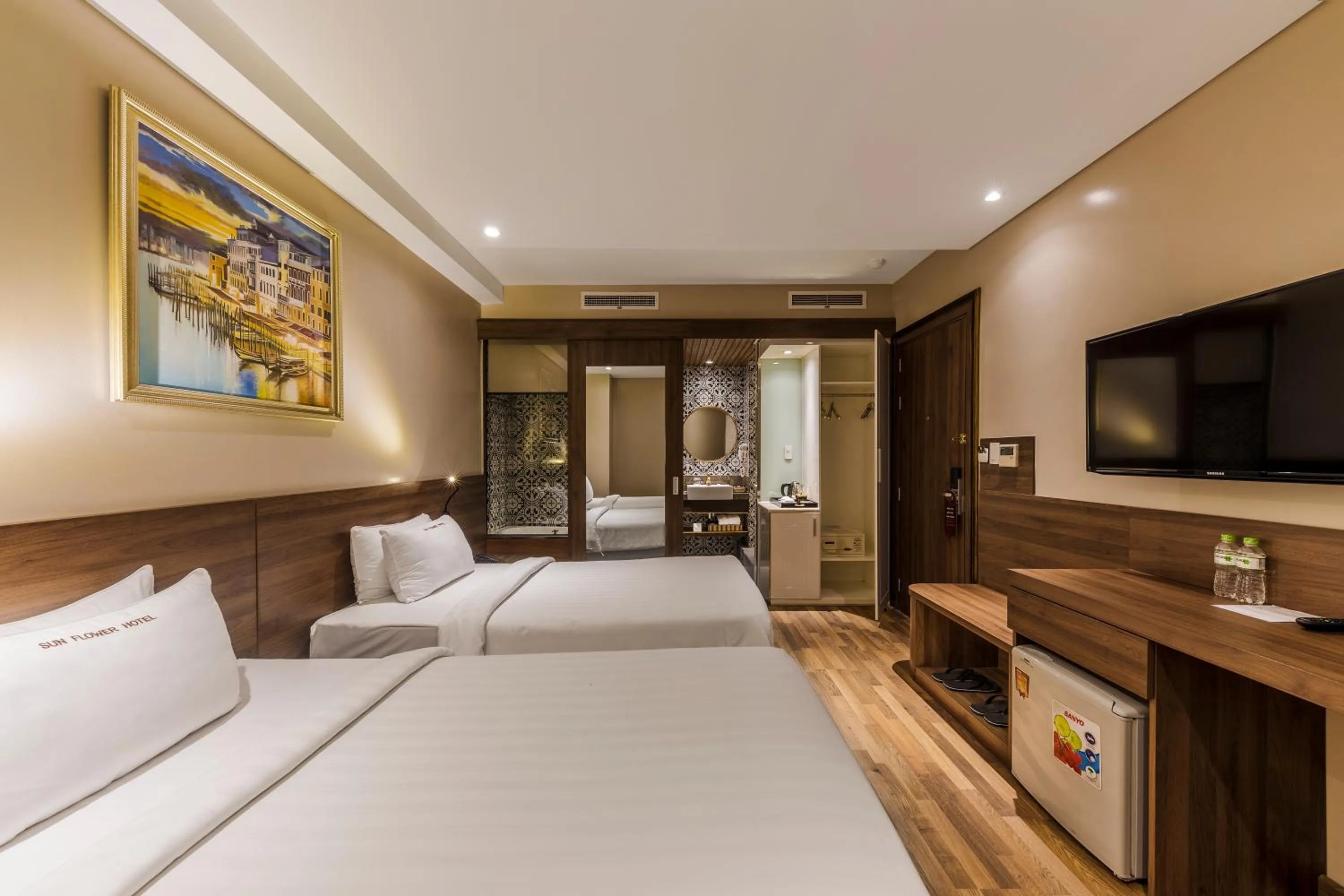 Bed in Sunflower Luxury Hotel