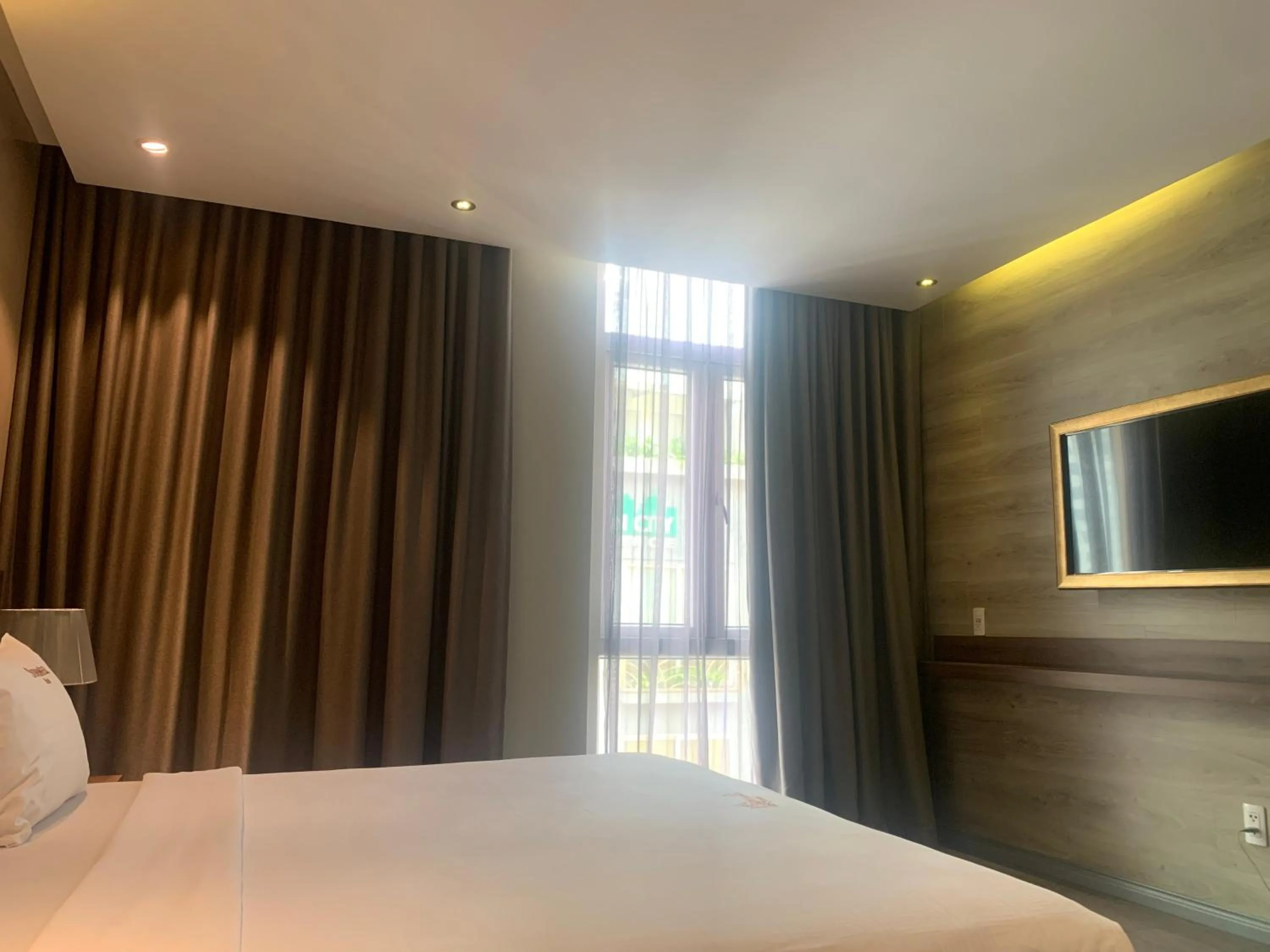 Bed in Sunflower Luxury Hotel