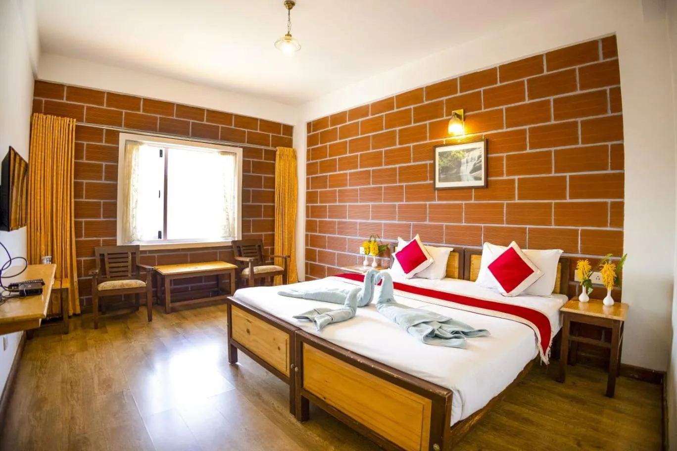 Bed in Altius Nest Hotel