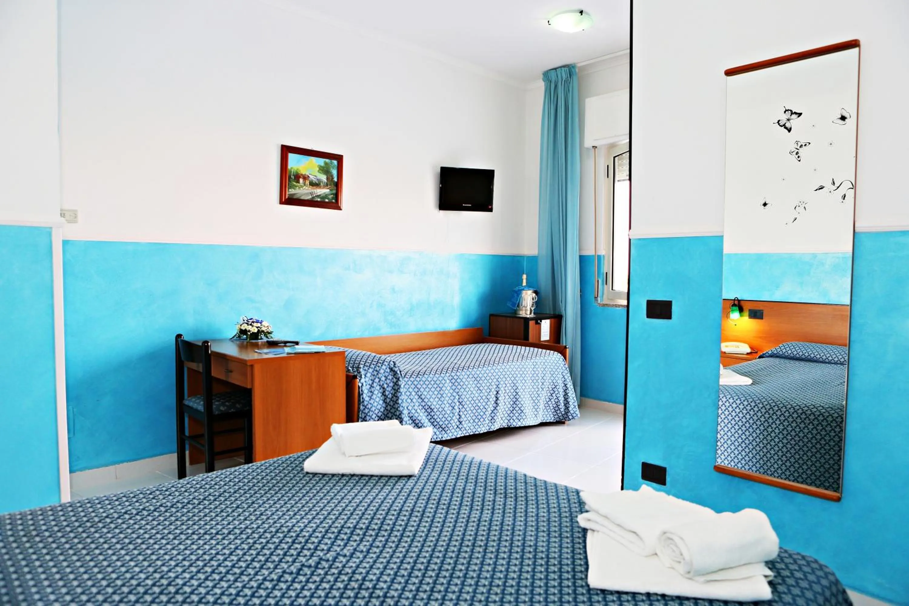 Bed in Hotel Blu Eden