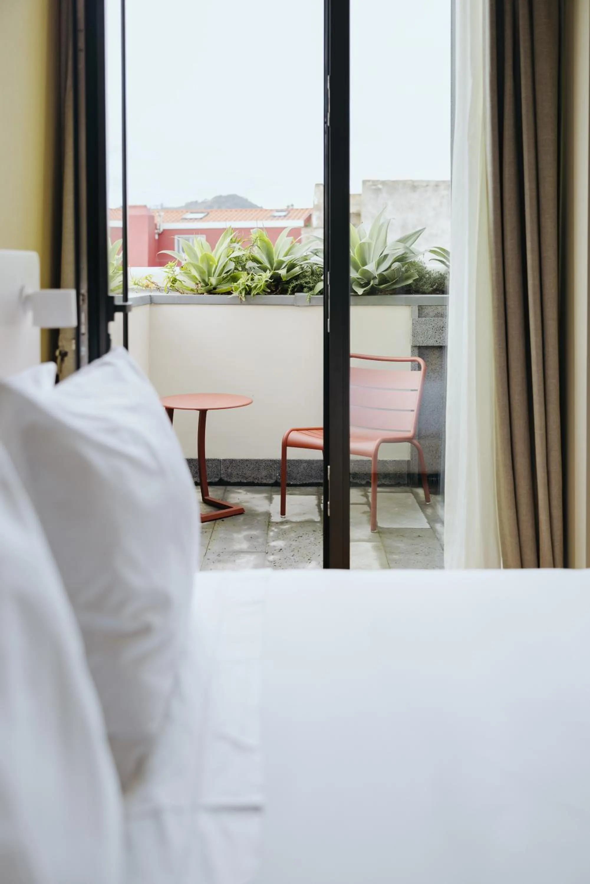 Balcony/Terrace, Bed in NINE DOTS Azorean Art Boutique Hotel