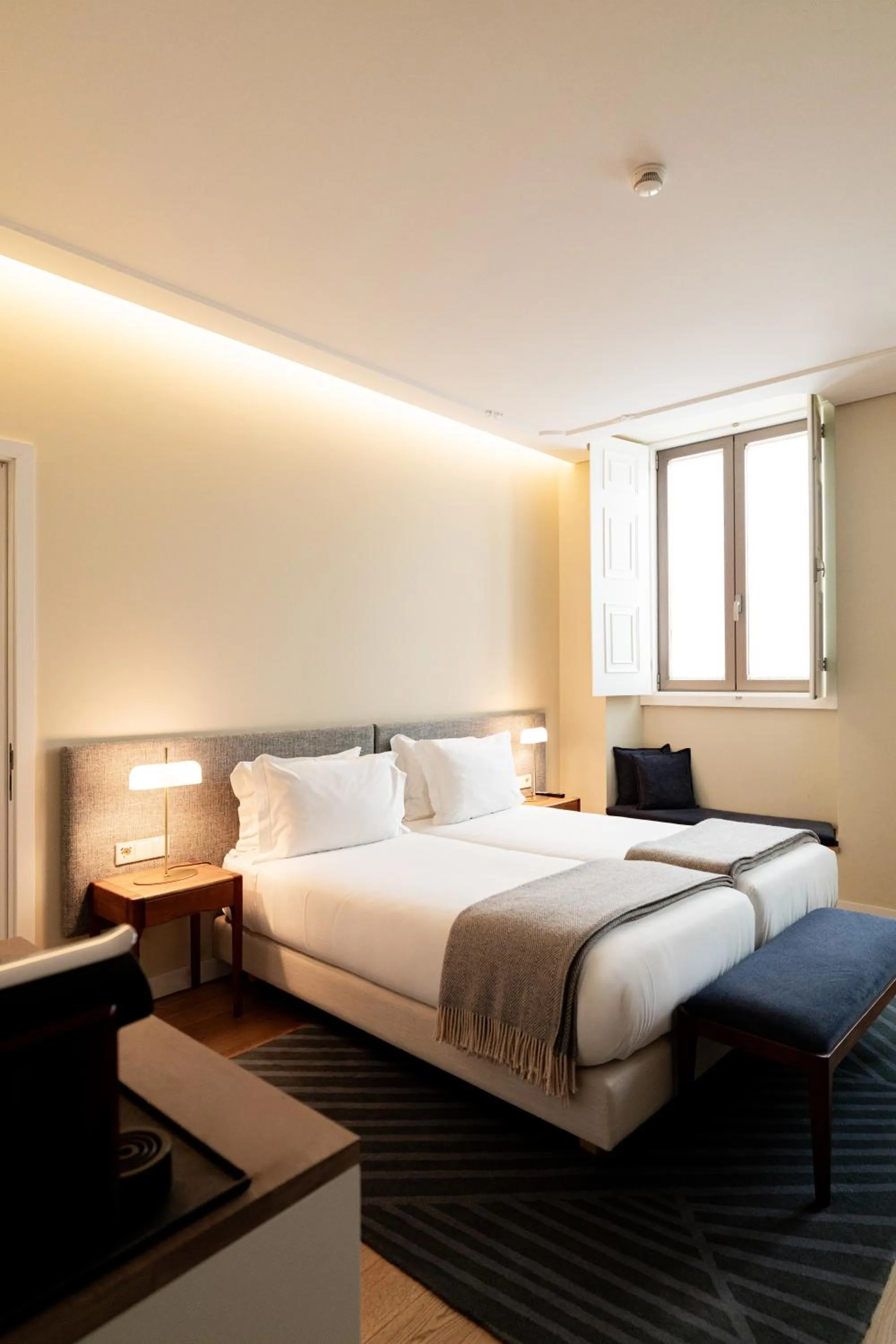 Bed in NINE DOTS Azorean Art Boutique Hotel