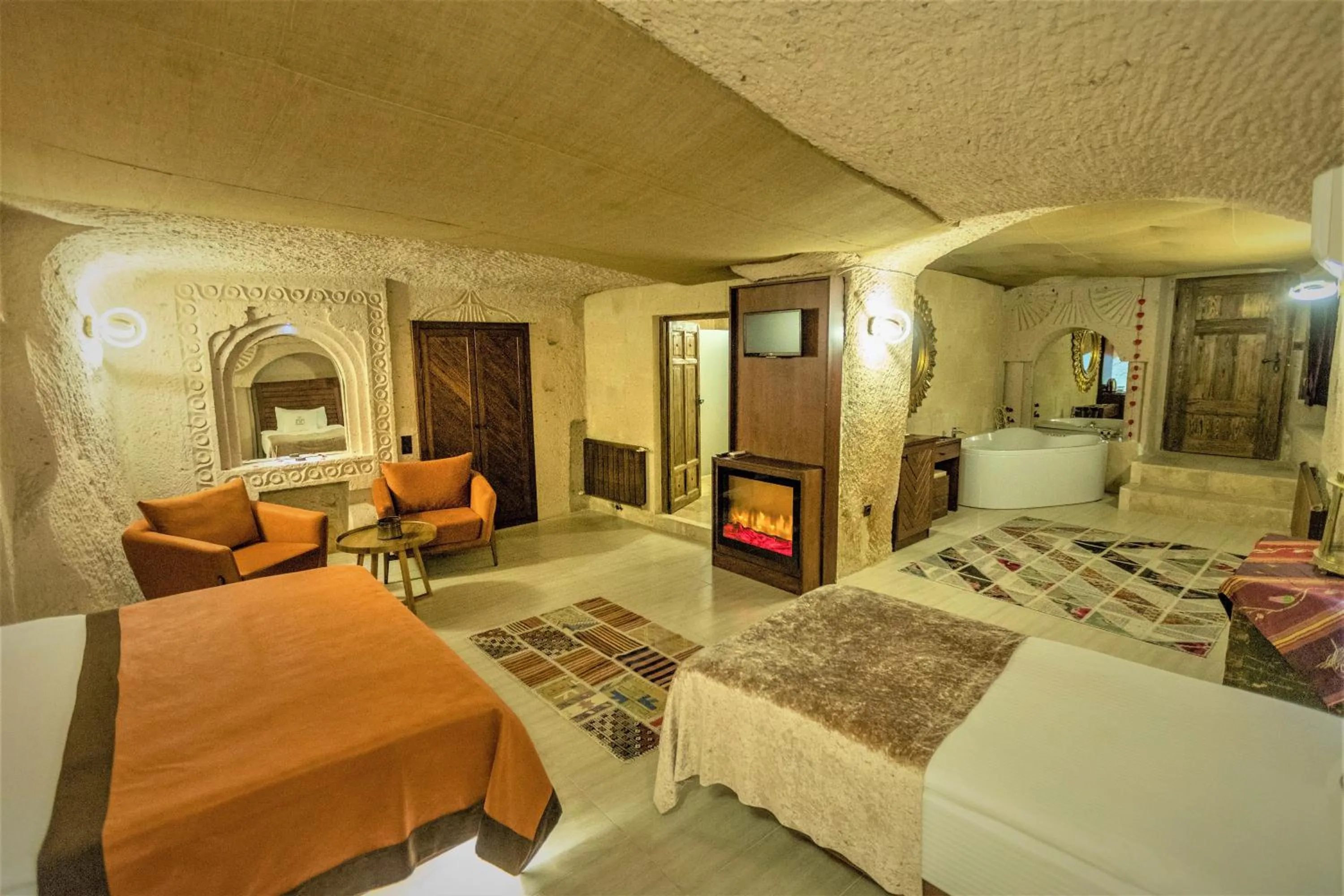 Living room, Bed in Mimi Cappadocia Luxury Cave Hotel
