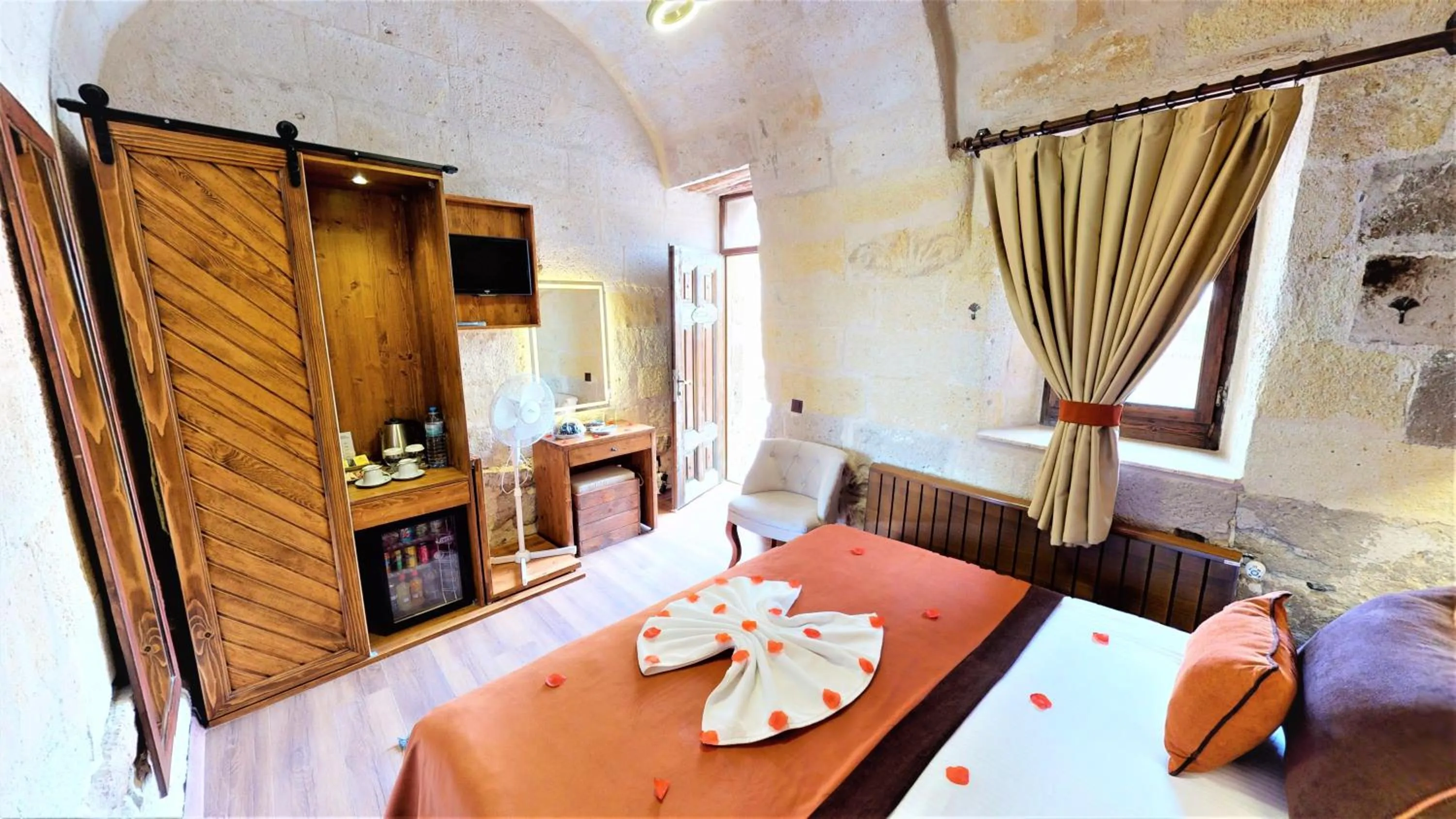 Bed in Mimi Cappadocia Luxury Cave Hotel