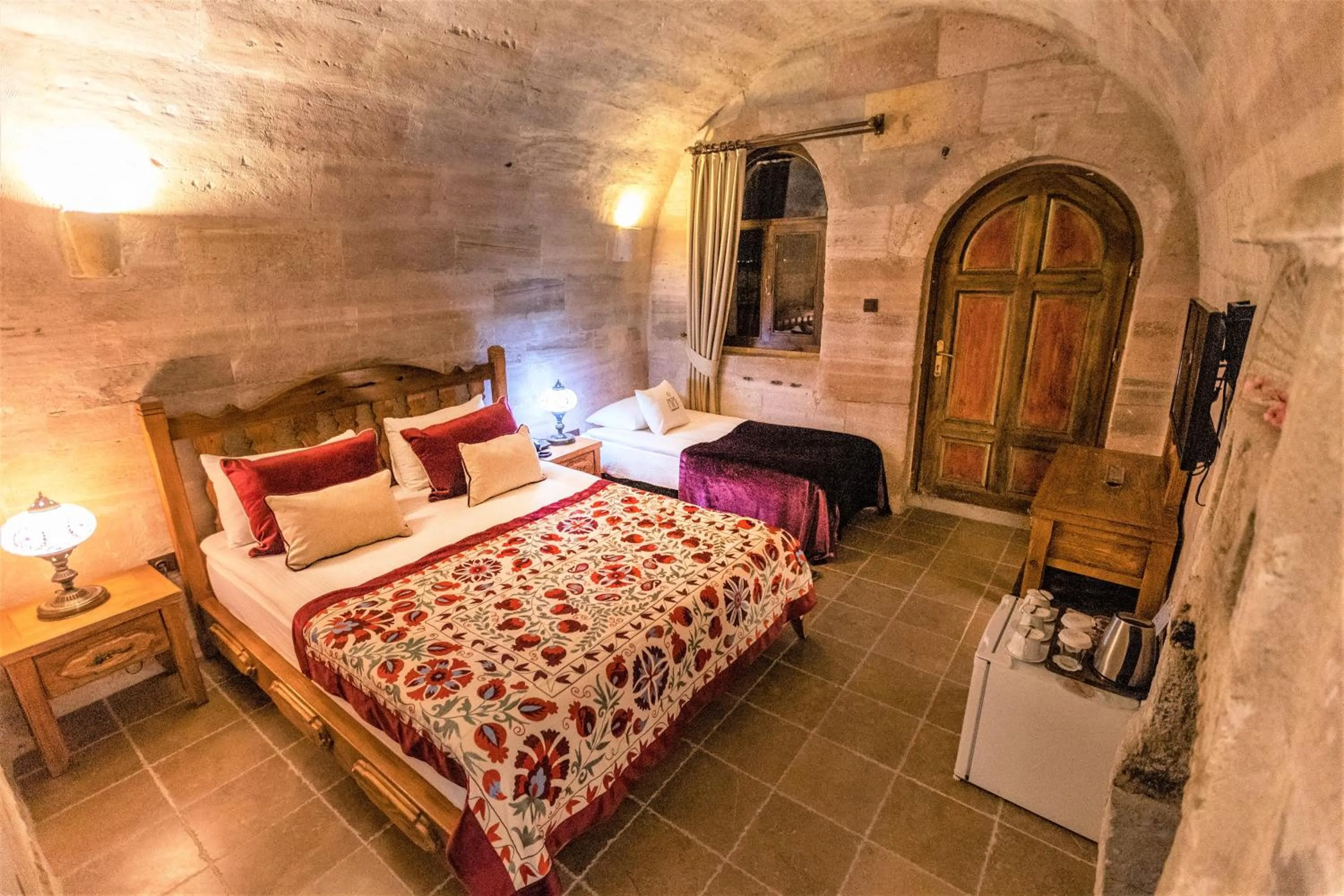 Photo of the whole room, Bed in Mimi Cappadocia Luxury Cave Hotel