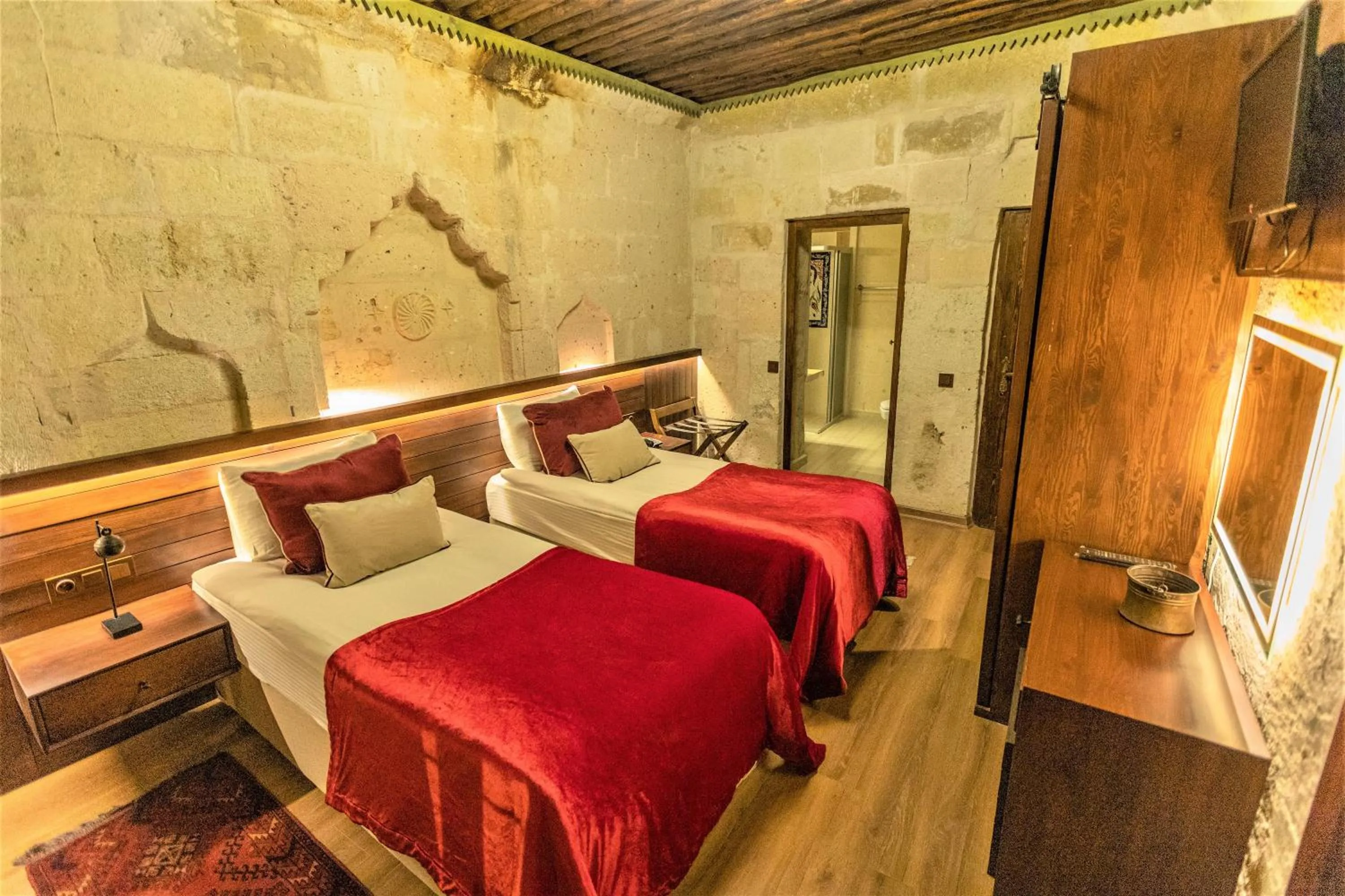 Bed in Mimi Cappadocia Luxury Cave Hotel