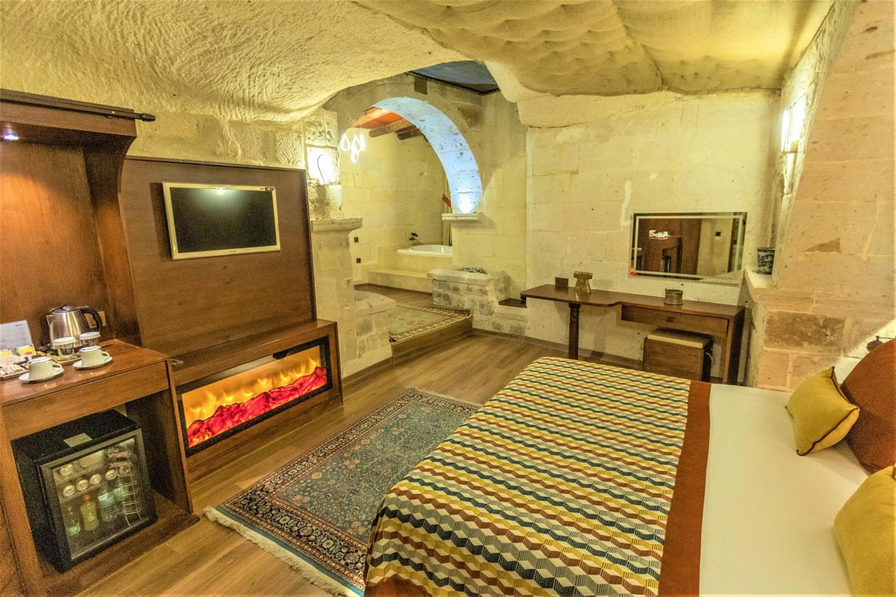 Bed in Mimi Cappadocia Luxury Cave Hotel