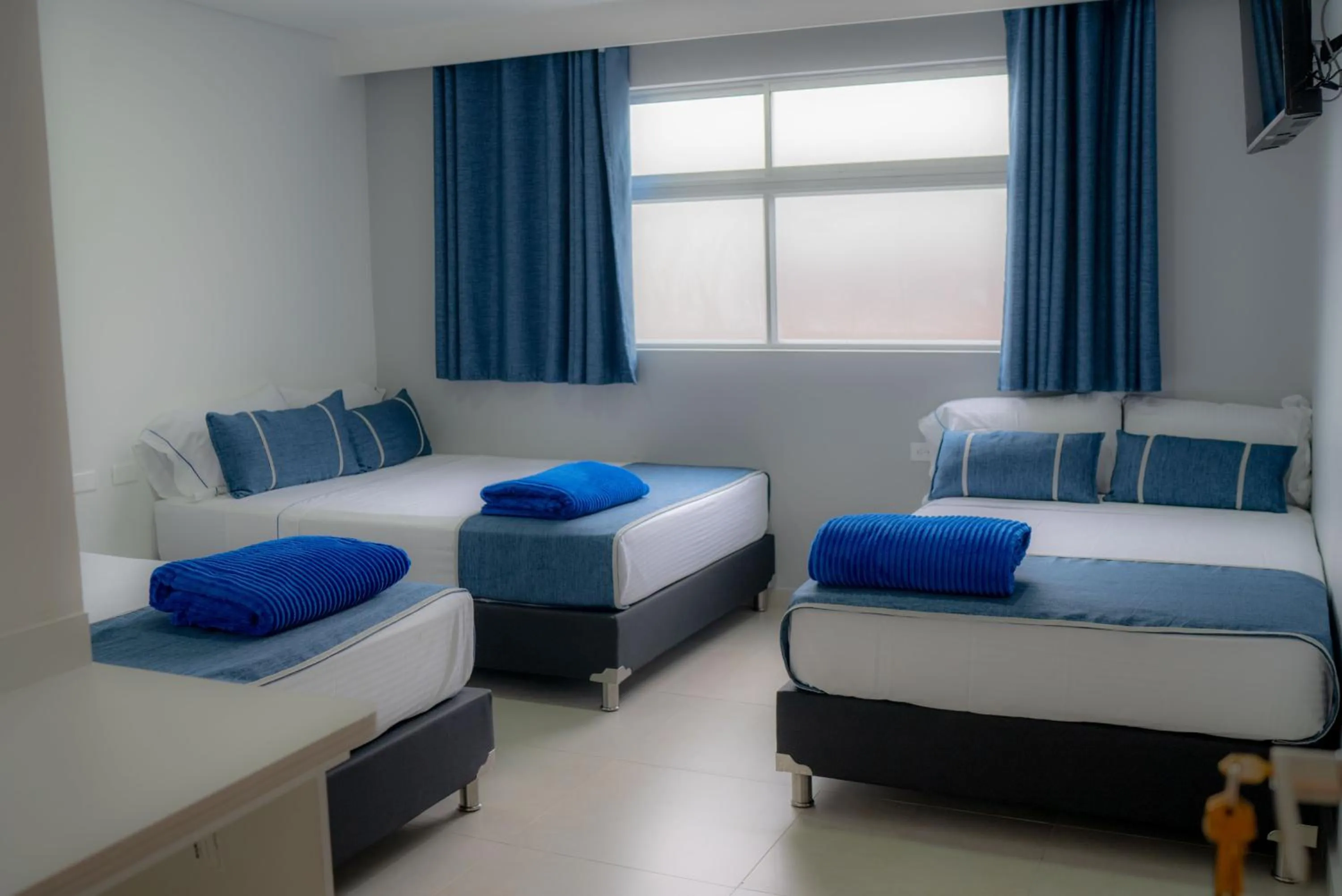 Bed in El Oscar Hotel