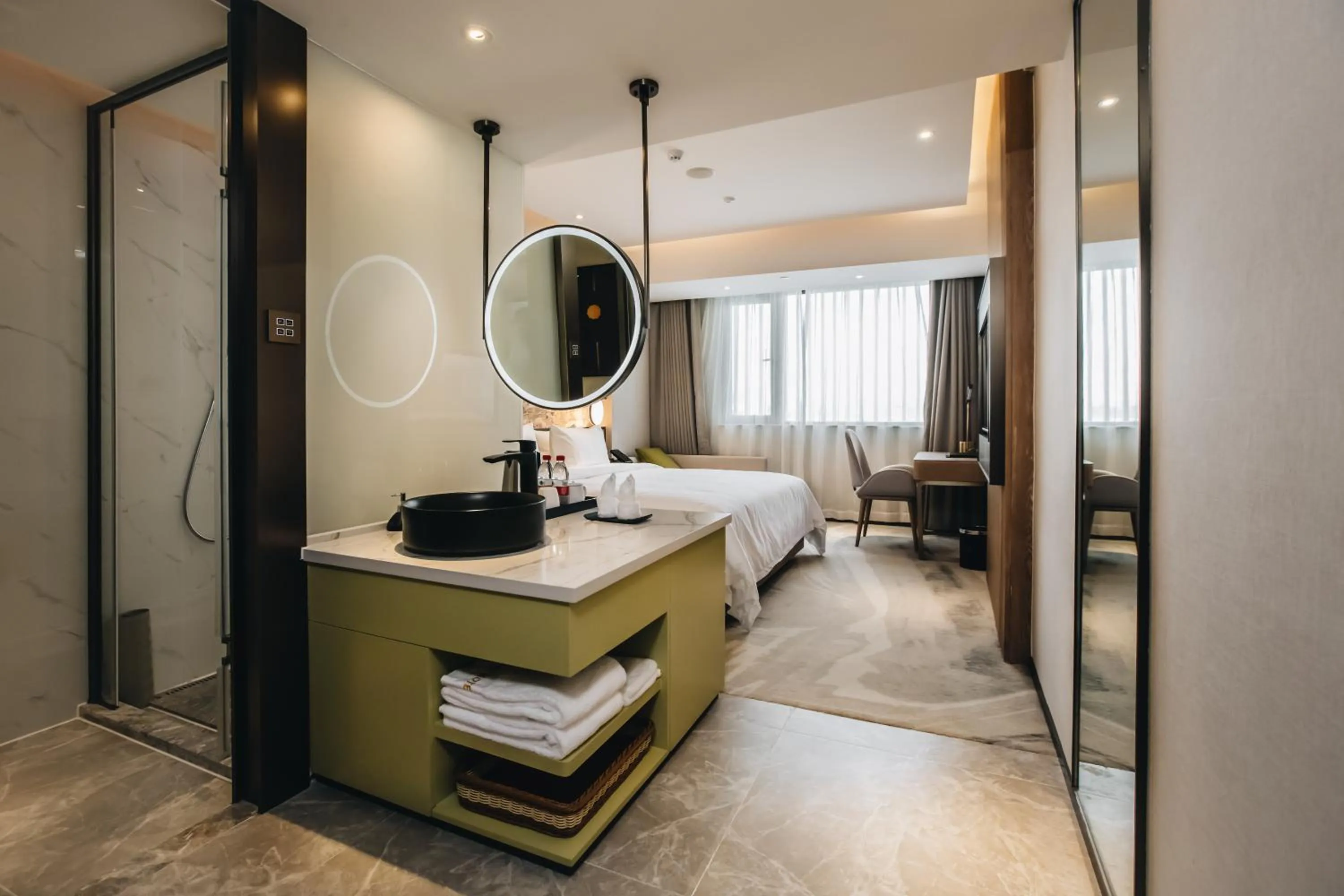 Photo of the whole room, Bed in Orienwit Hotel-Free Shuttle Bus fir Canton Fair