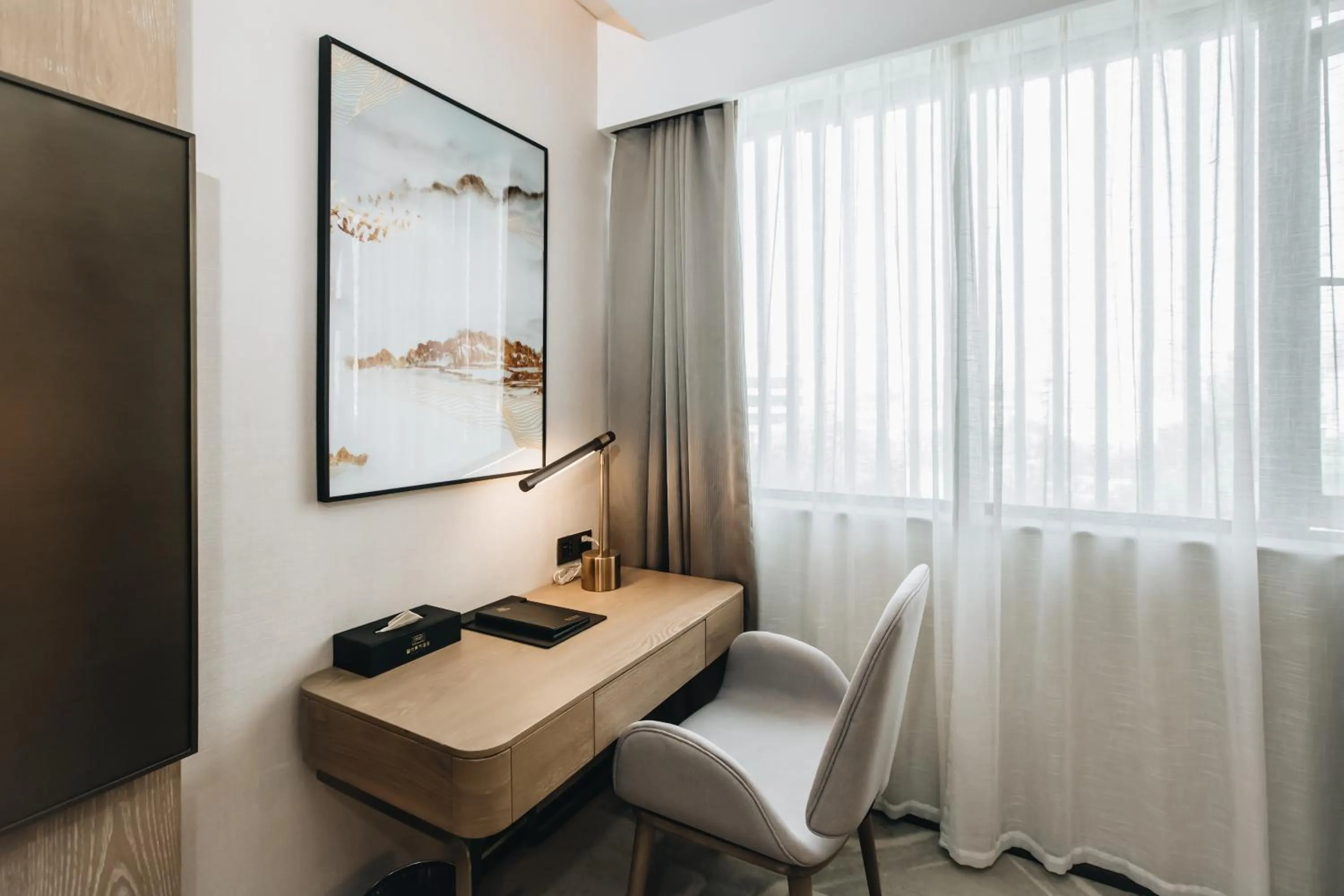 Photo of the whole room in Orienwit Hotel-Free Shuttle Bus fir Canton Fair