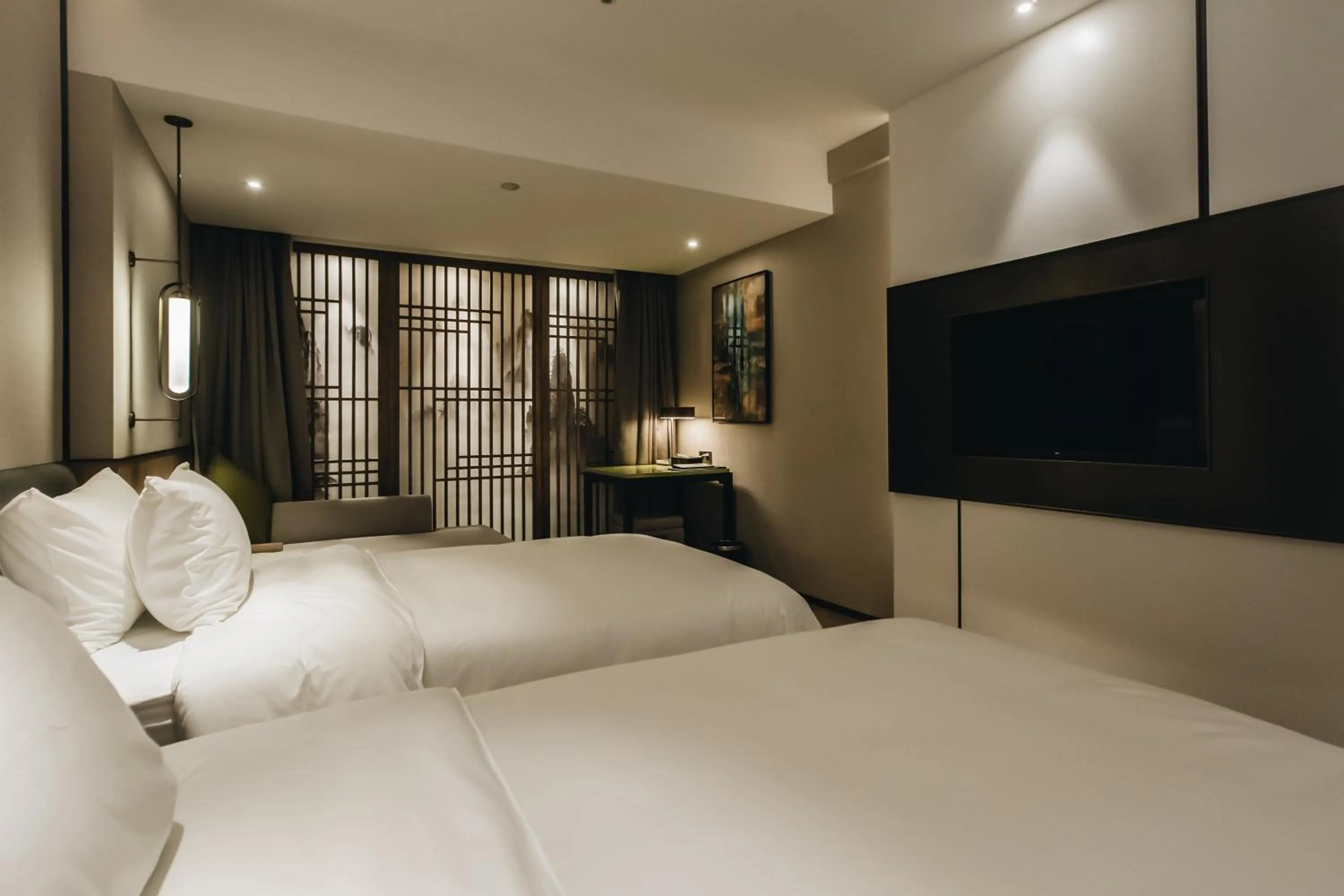 Photo of the whole room, Bed in Orienwit Hotel-Free Shuttle Bus fir Canton Fair