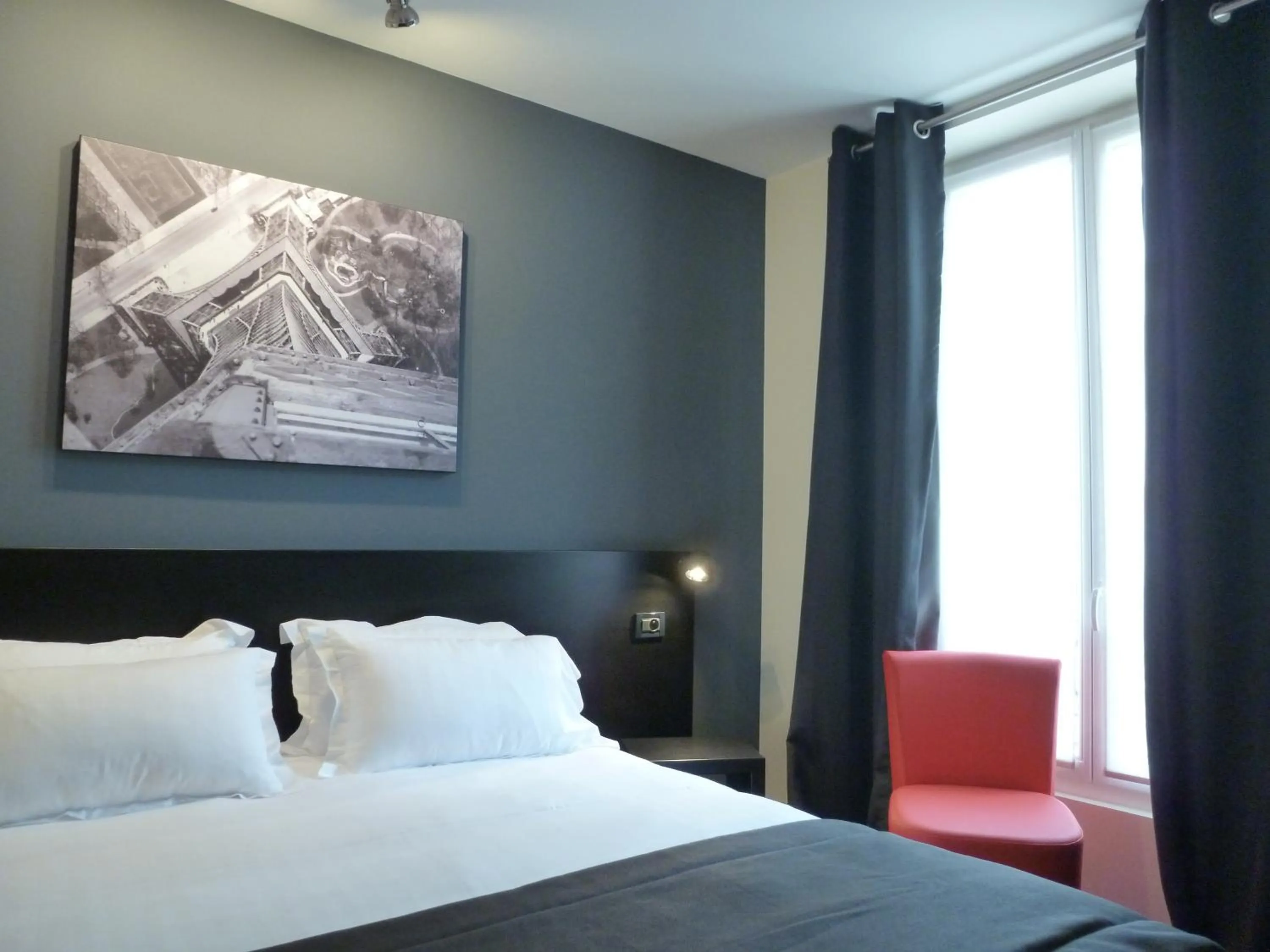 Bed in Helussi Hôtel