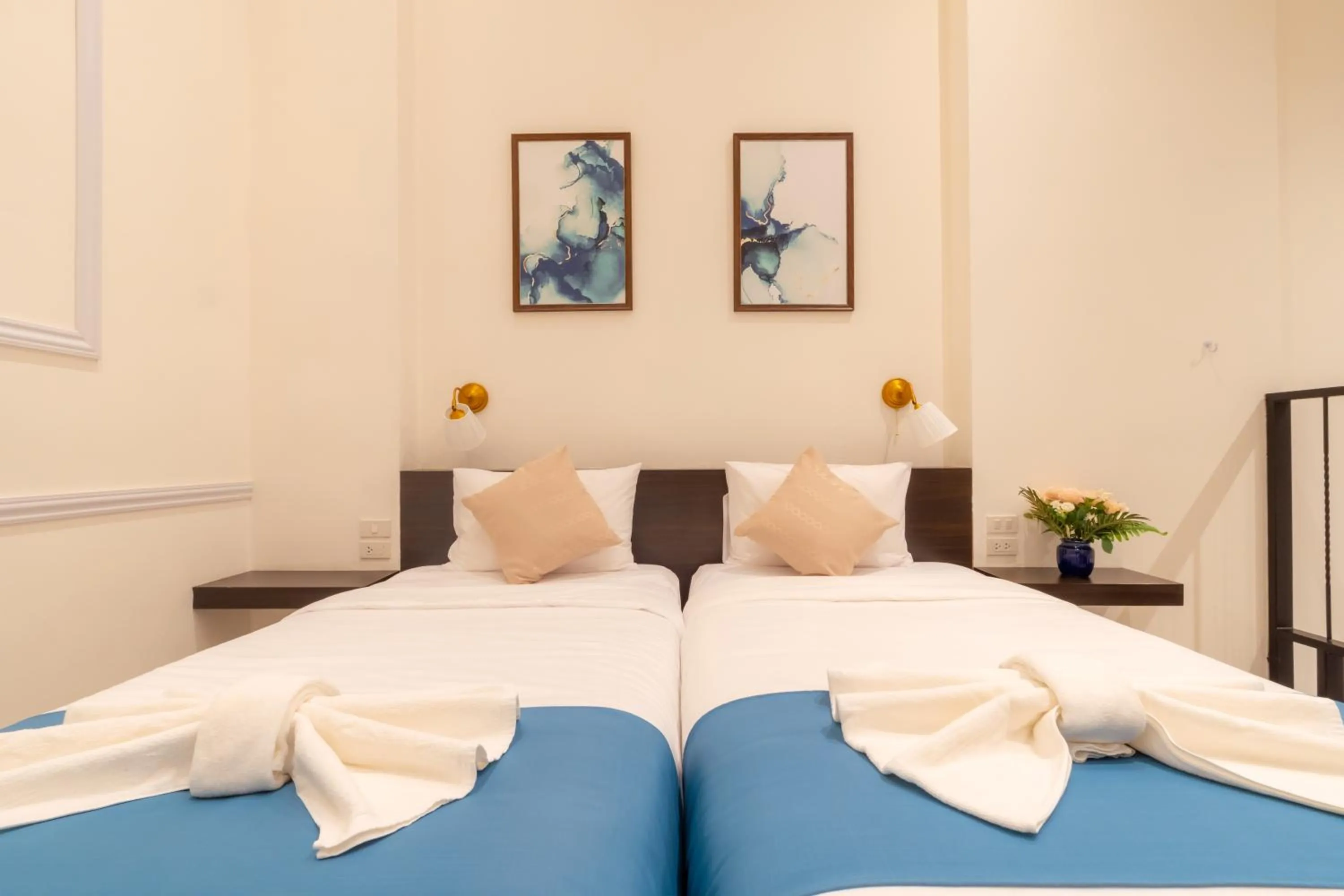 Bed in Le ville lanna Chiang Mai Gate Old Town Hotel