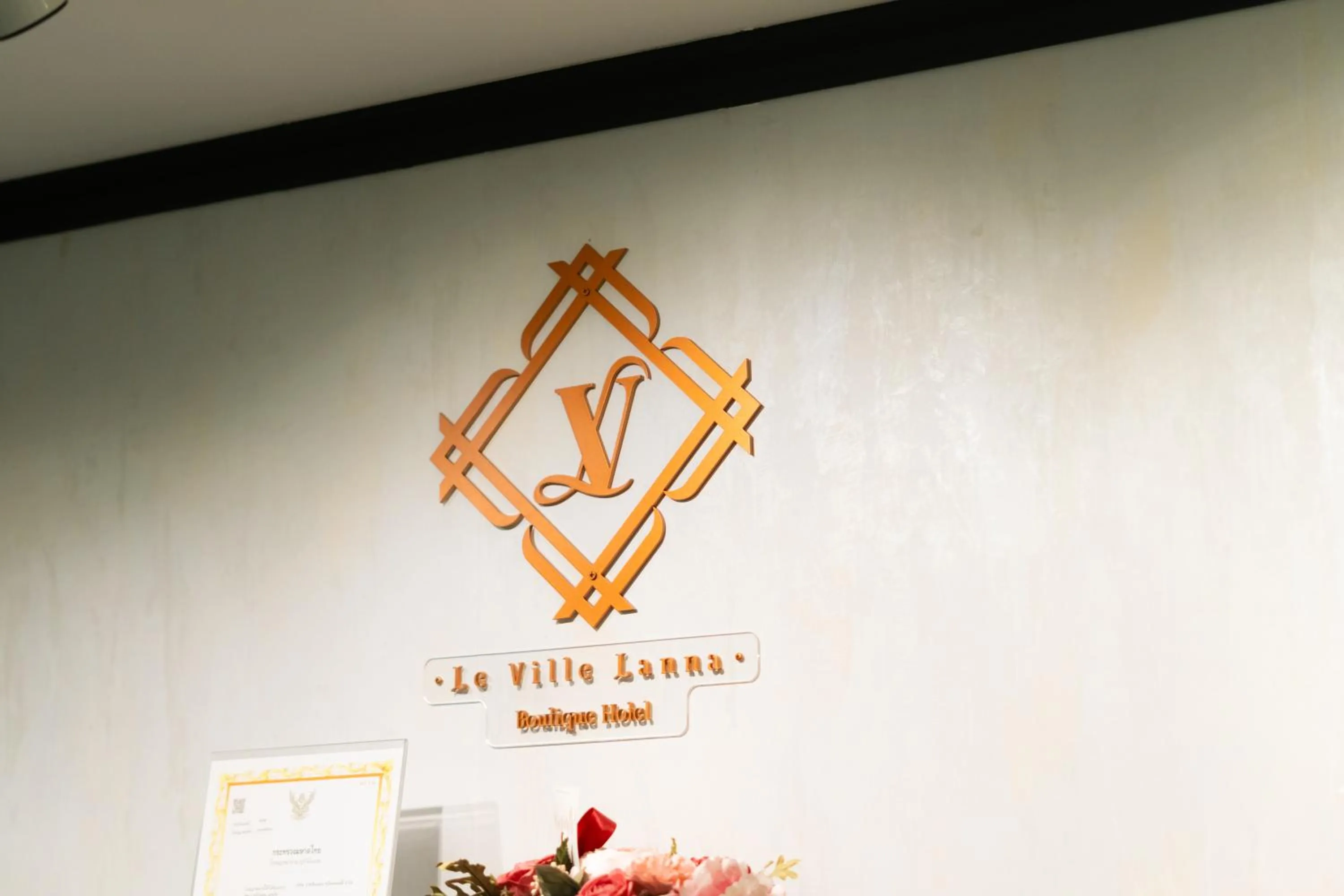 Property logo or sign in Le ville lanna Chiang Mai Gate Old Town Hotel