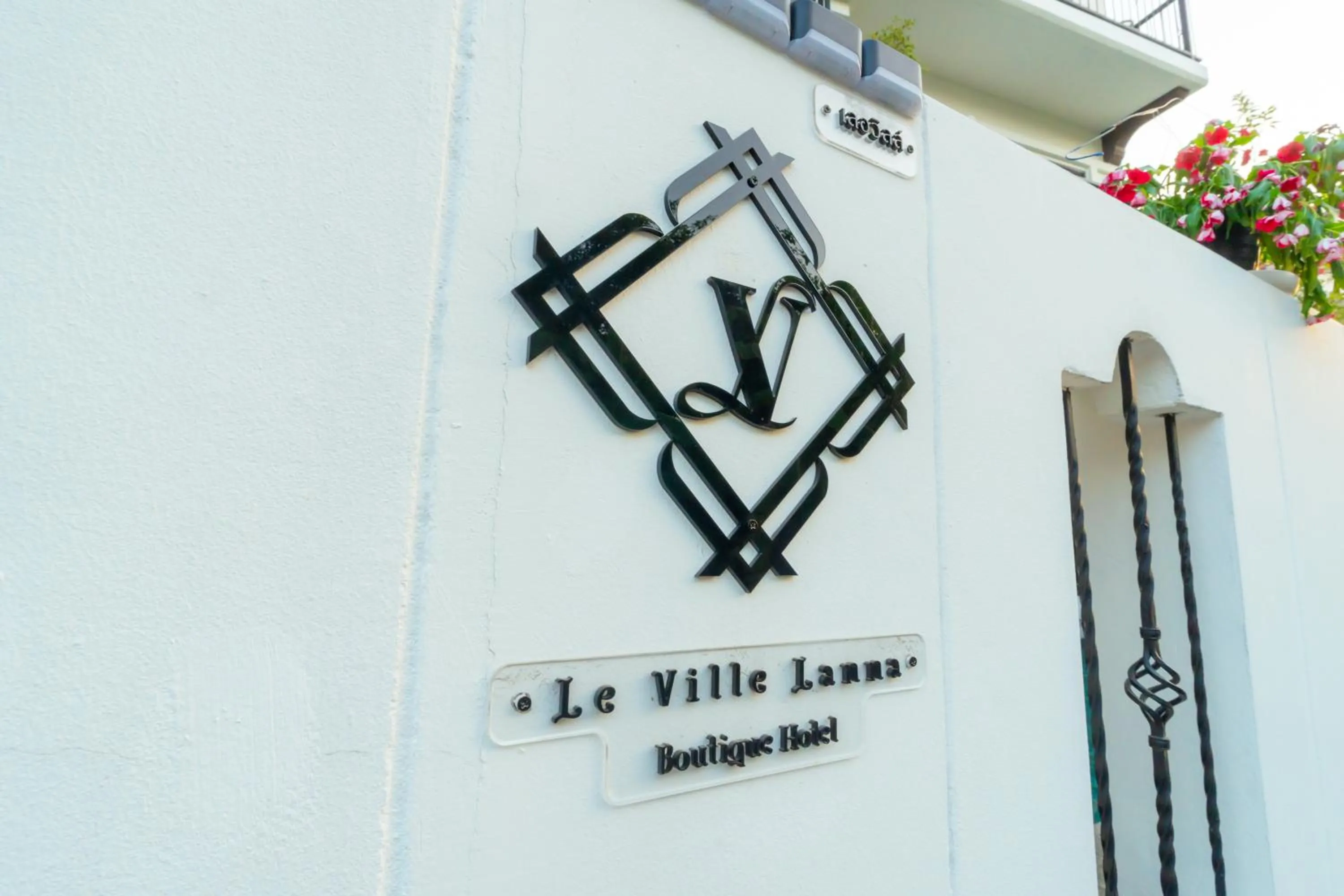 Property logo or sign in Le ville lanna Chiang Mai Gate Old Town Hotel