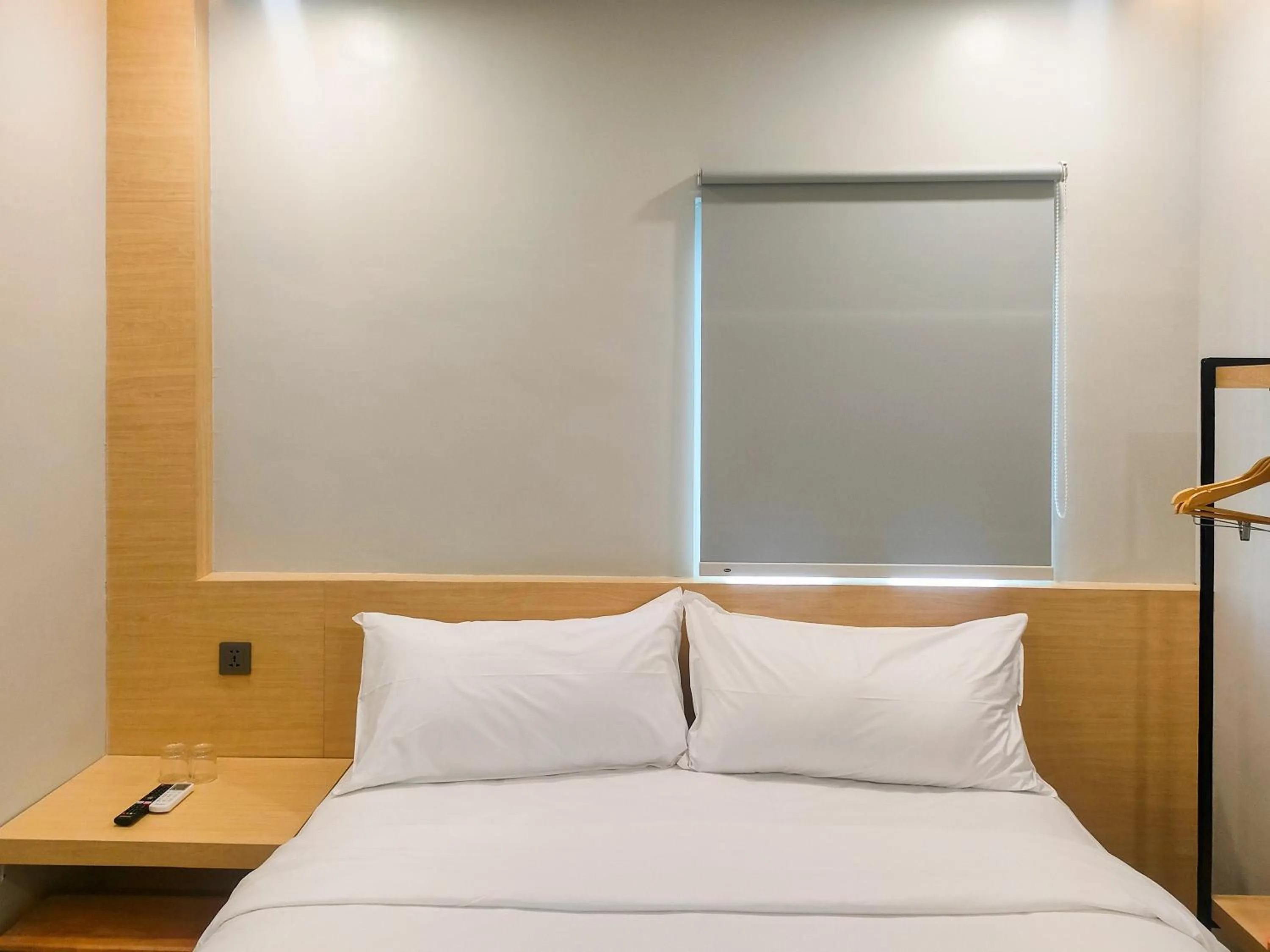 Bed in Travel Biz Hotel Medan Mitra RedDoorz