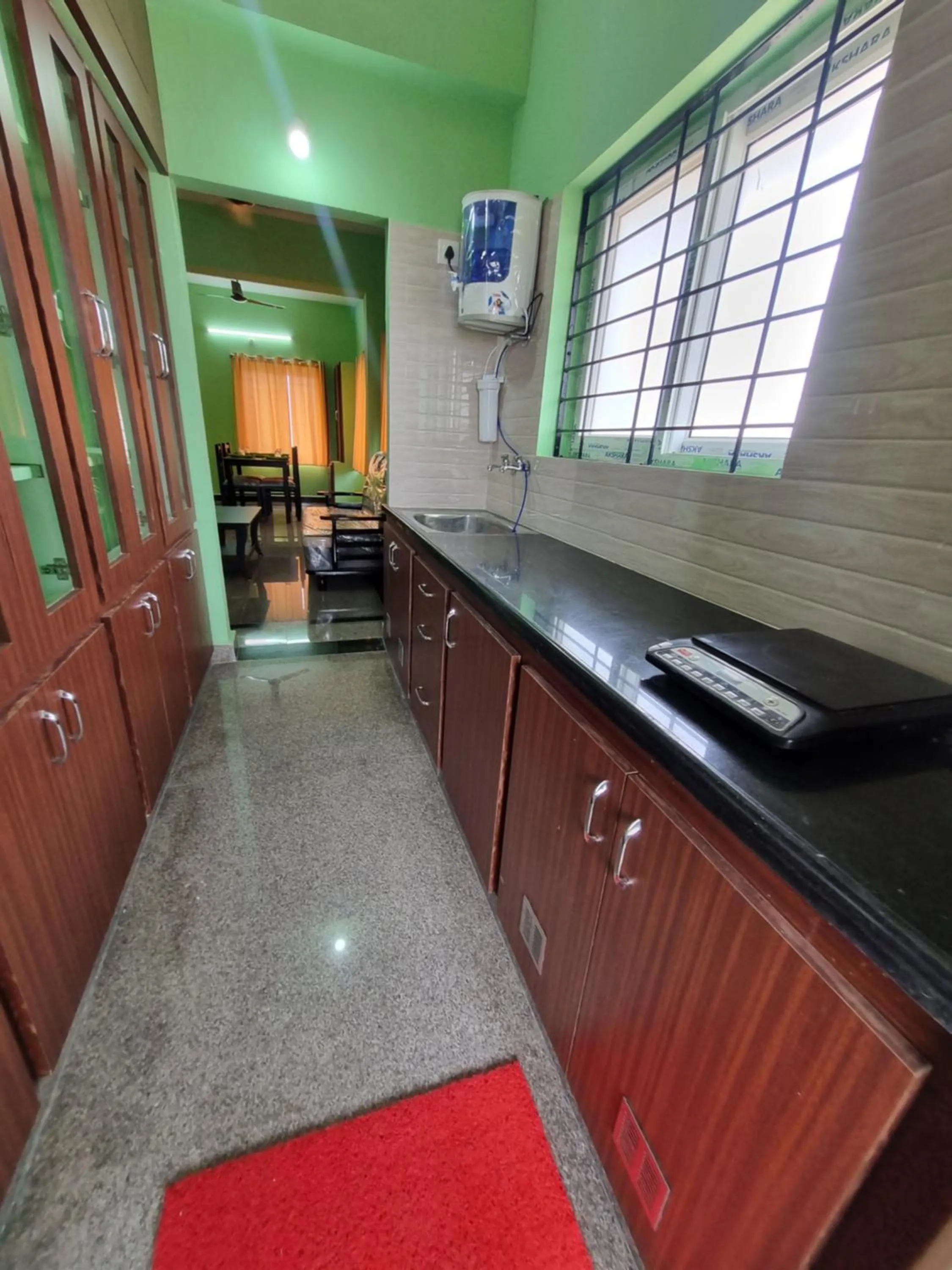 Kitchen or kitchenette in Aditya Homestay
