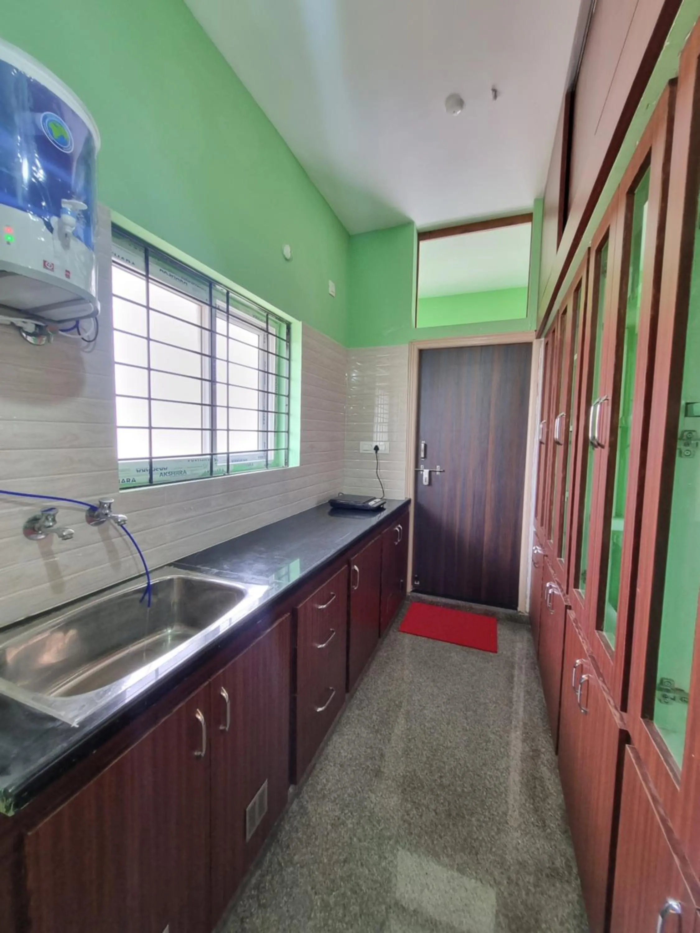 Kitchen or kitchenette in Aditya Homestay