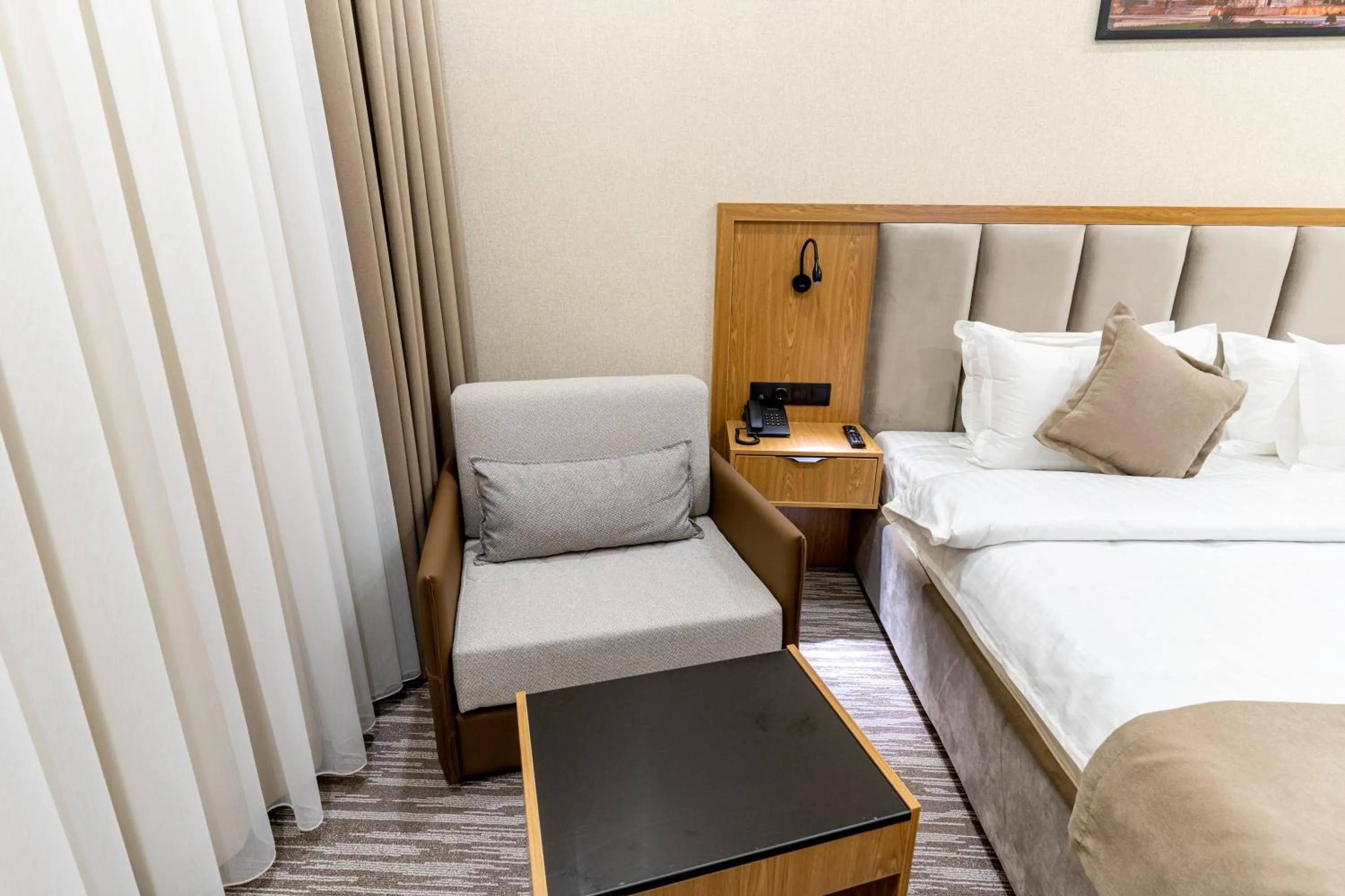 Bed in MIRZO HOTEL