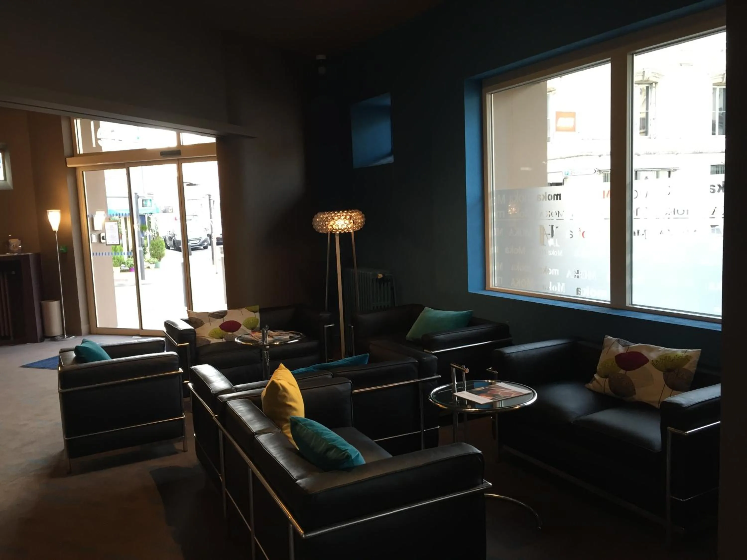 Communal lounge/ TV room in Moka Hotel