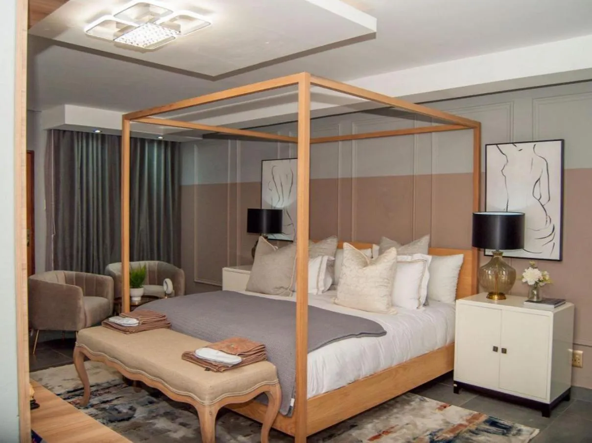 Bed in The Lux Hotel and Resorts