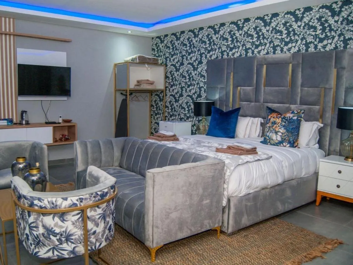 Bed in The Lux Hotel and Resorts