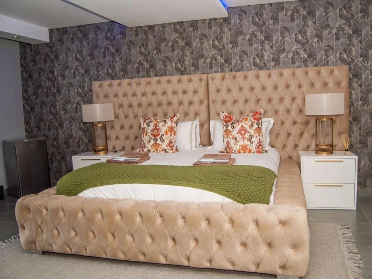 Bed in The Lux Hotel and Resorts