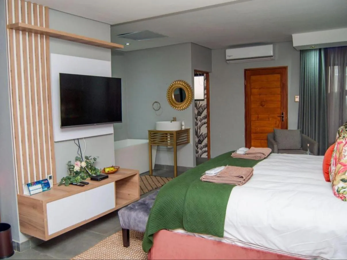 Photo of the whole room, Bed in The Lux Hotel and Resorts