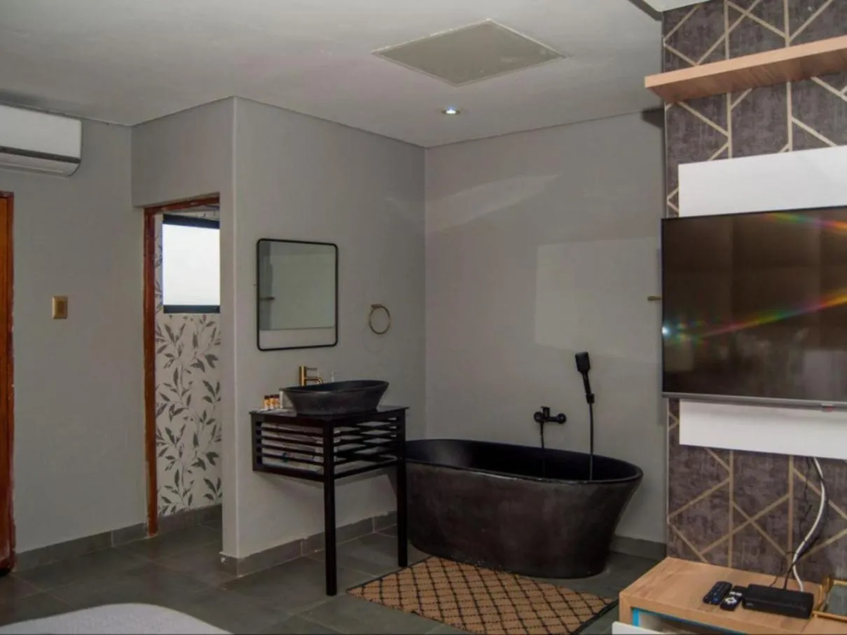 Bathroom in The Lux Hotel and Resorts