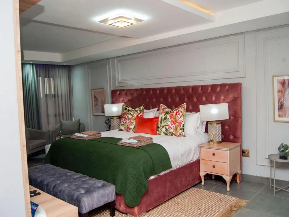 Bed in The Lux Hotel and Resorts