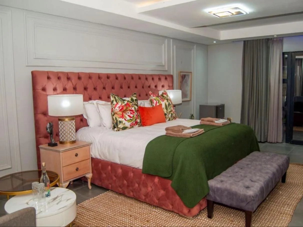 Bed in The Lux Hotel and Resorts