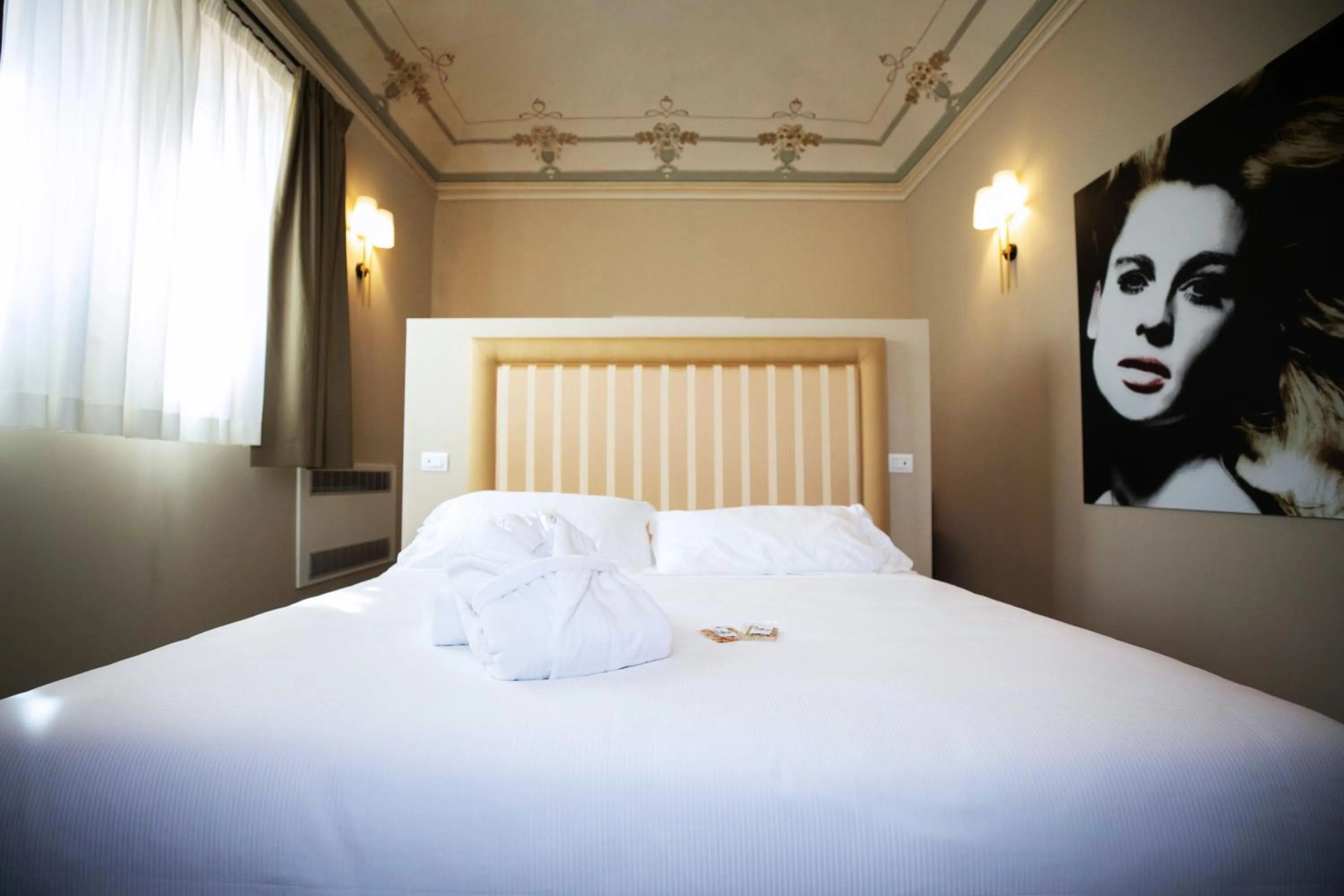 Bed in Lanterne Magiche Ortigia Suites