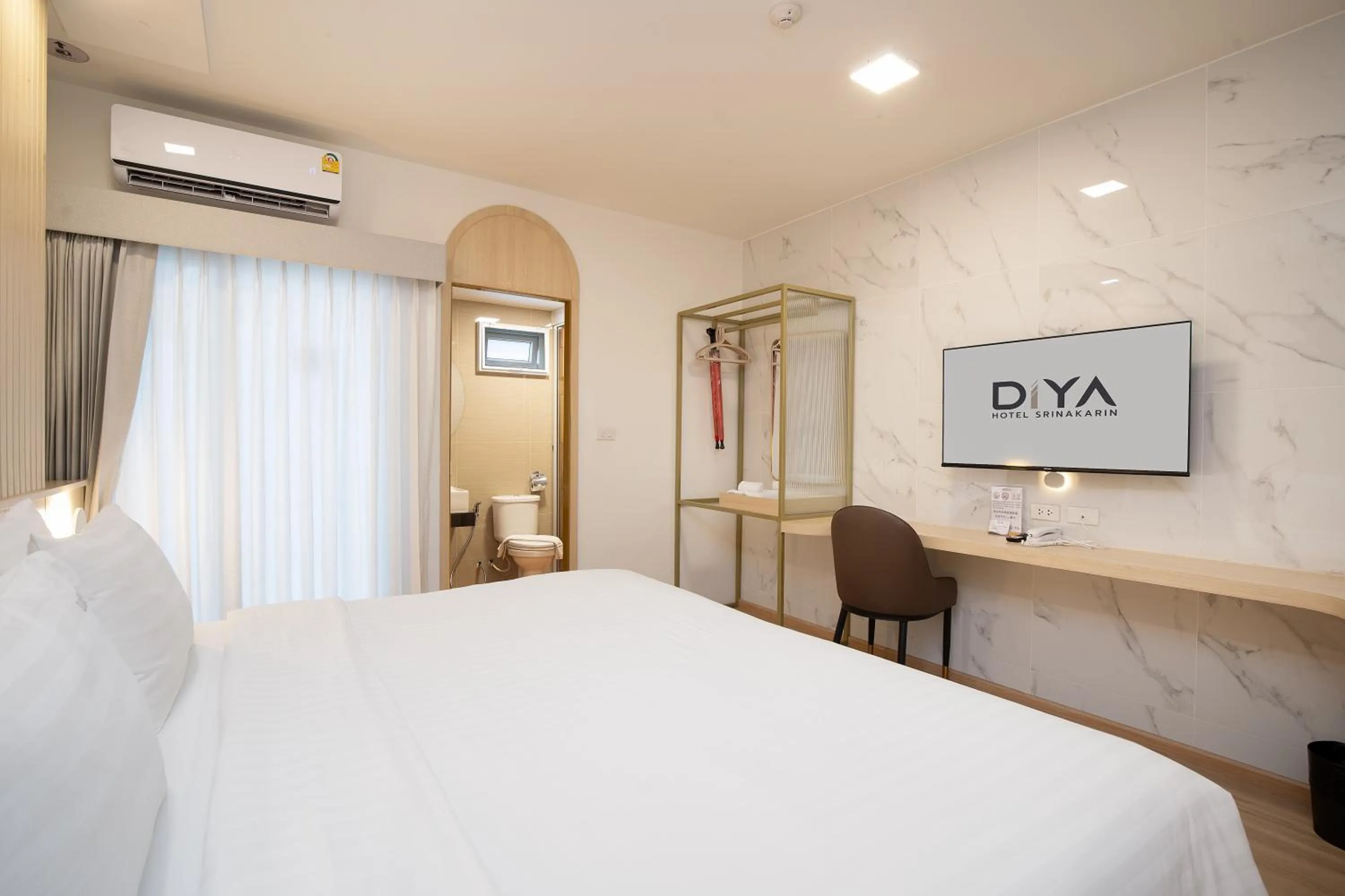 Bed in Diya Hotel Bangkok