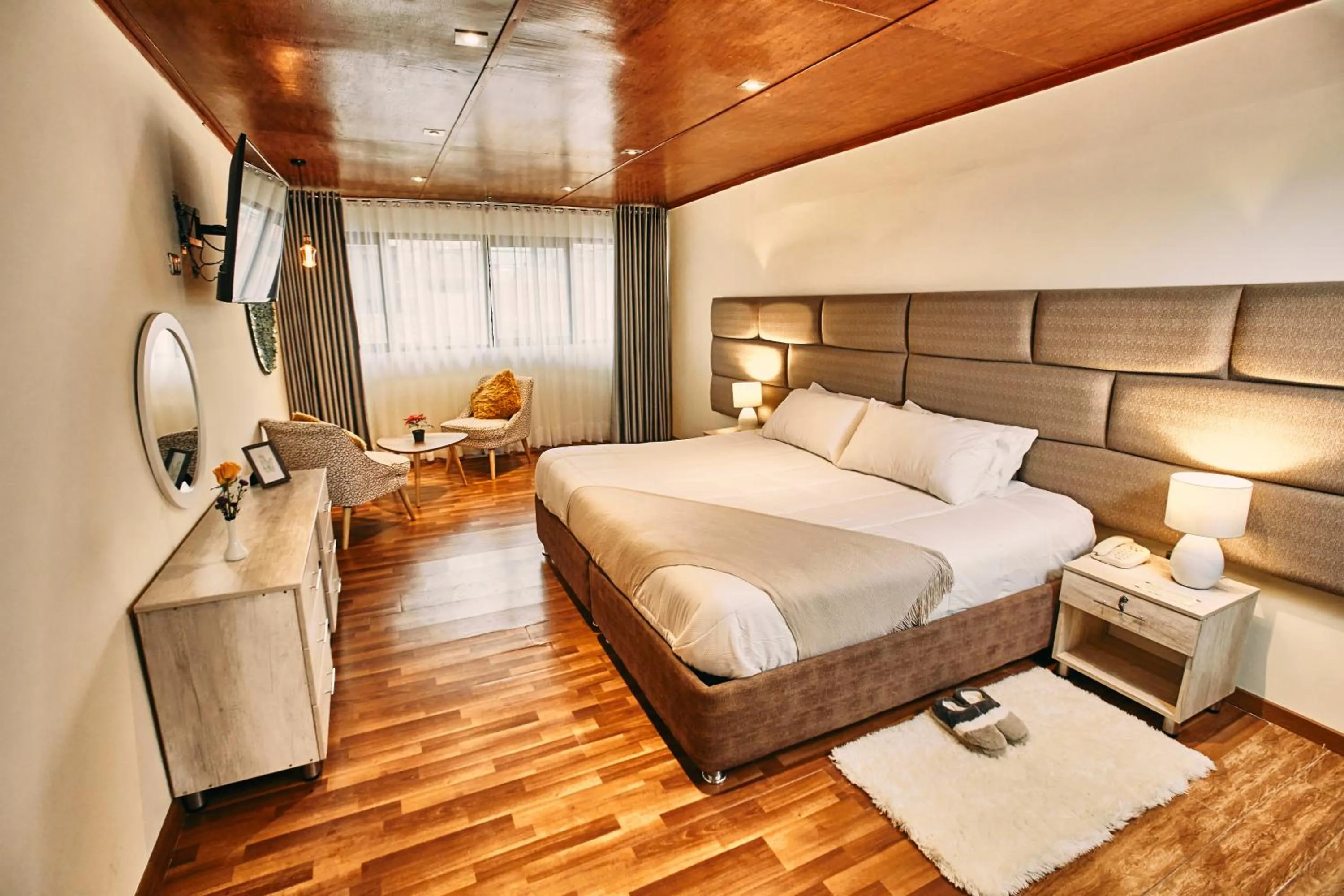 Bed in Inti Tampu Inn