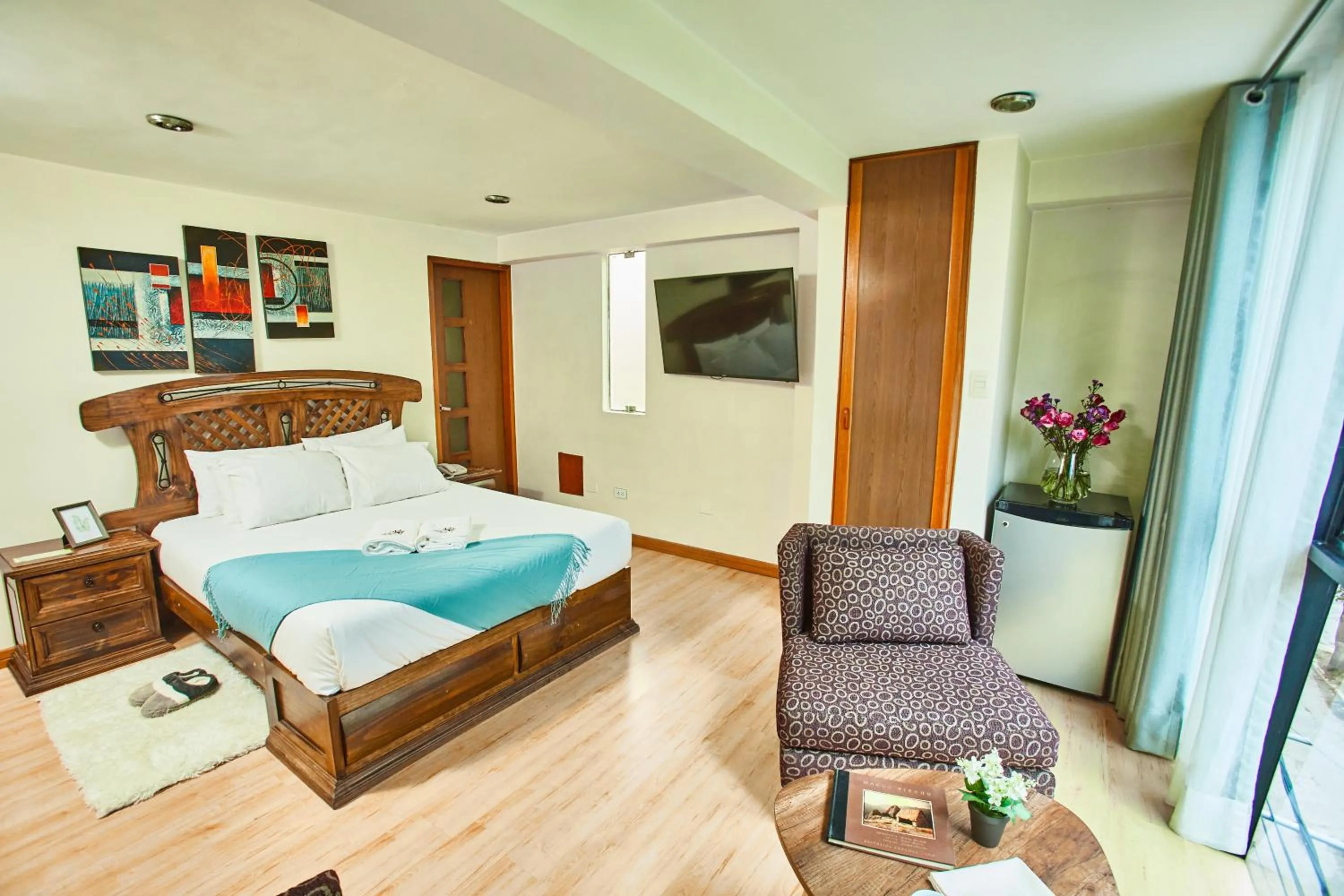 Bed in Inti Tampu Inn