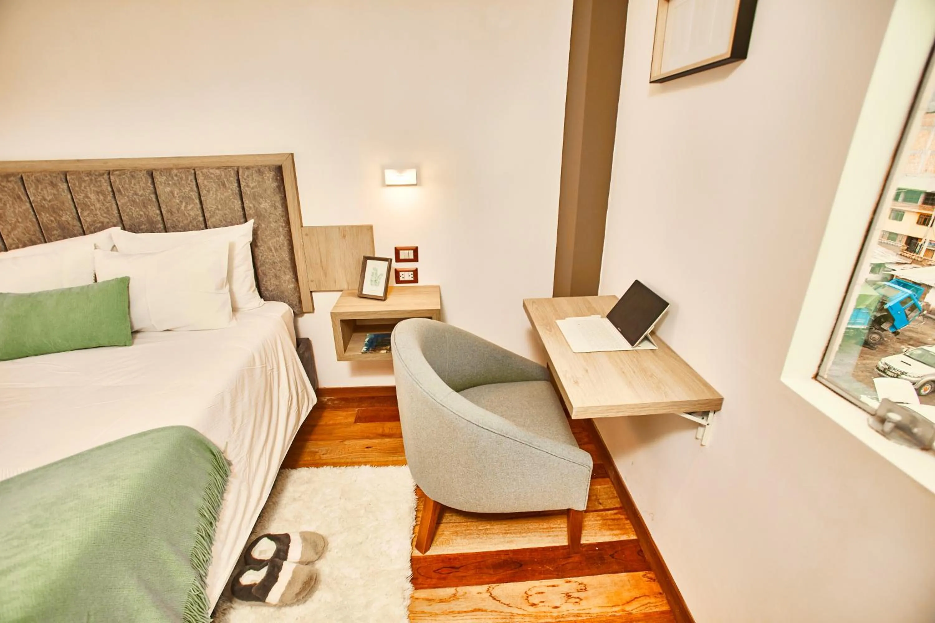 Bed in Inti Tampu Inn