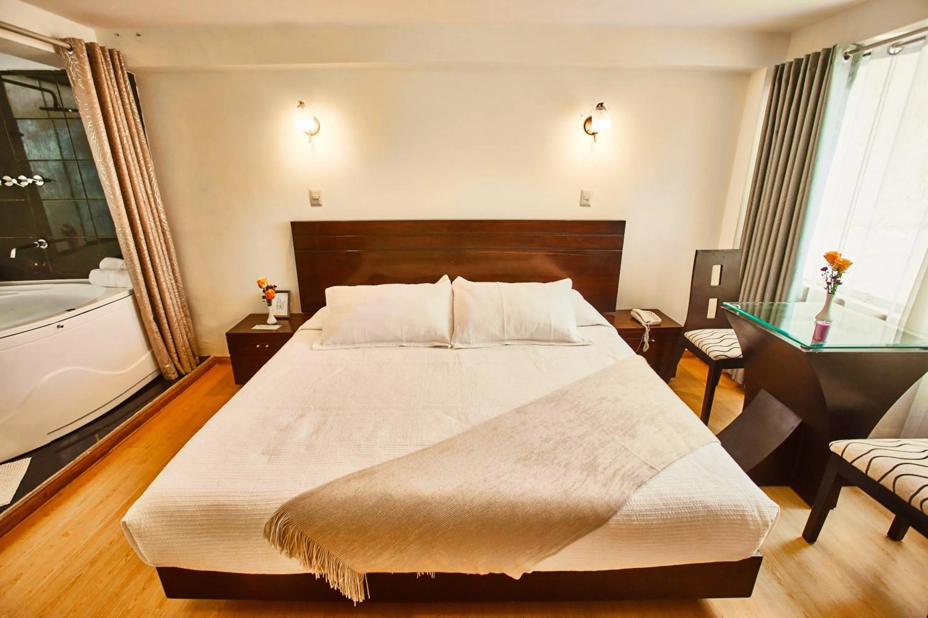 Bed in Inti Tampu Inn