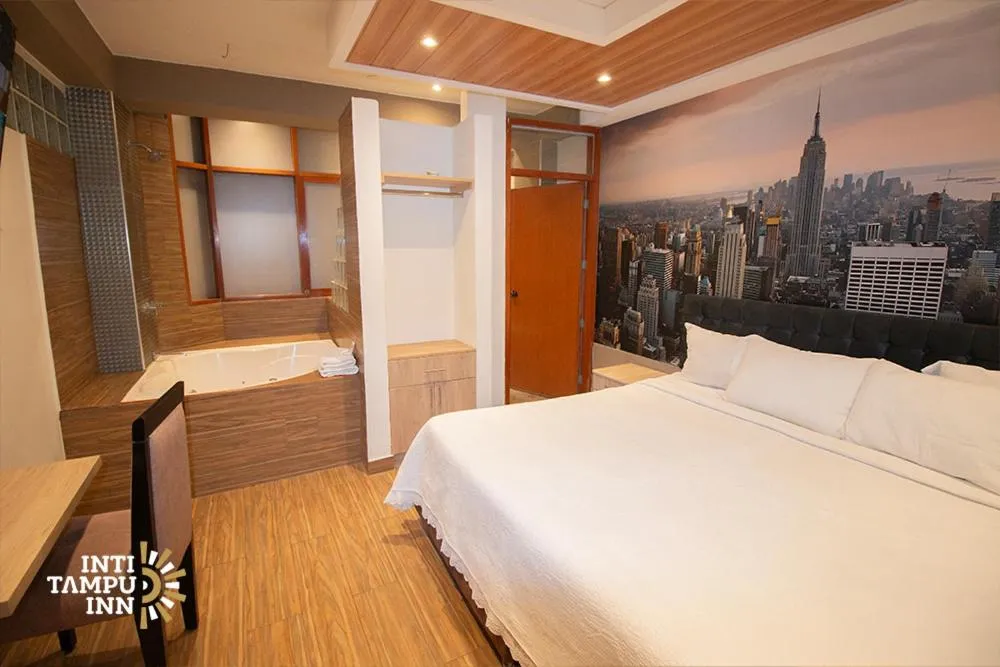 Bed in Inti Tampu Inn