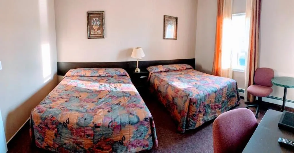 Bed in Bonnyville Hotel
