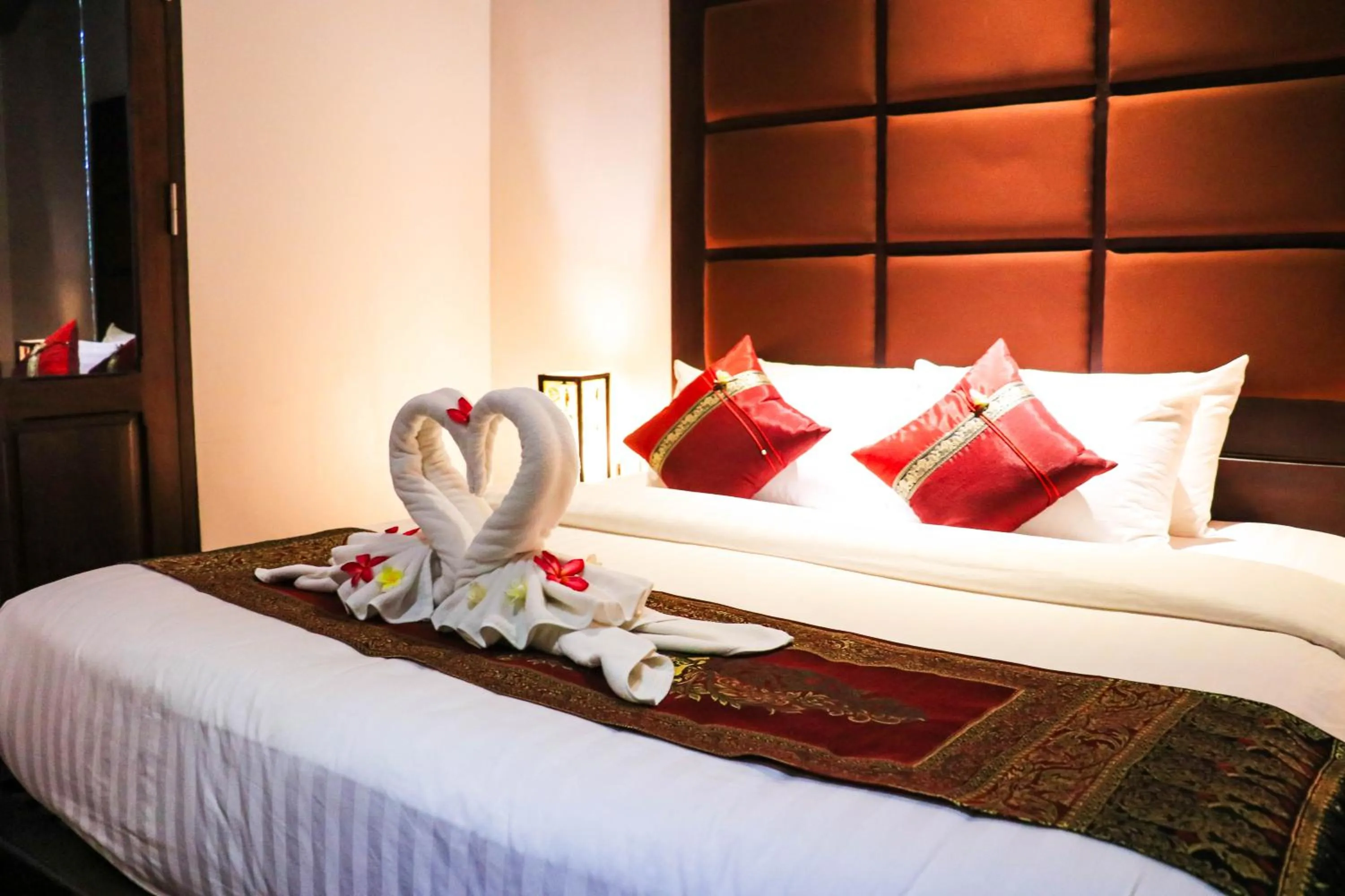 Bed in Meuangluang Hotel