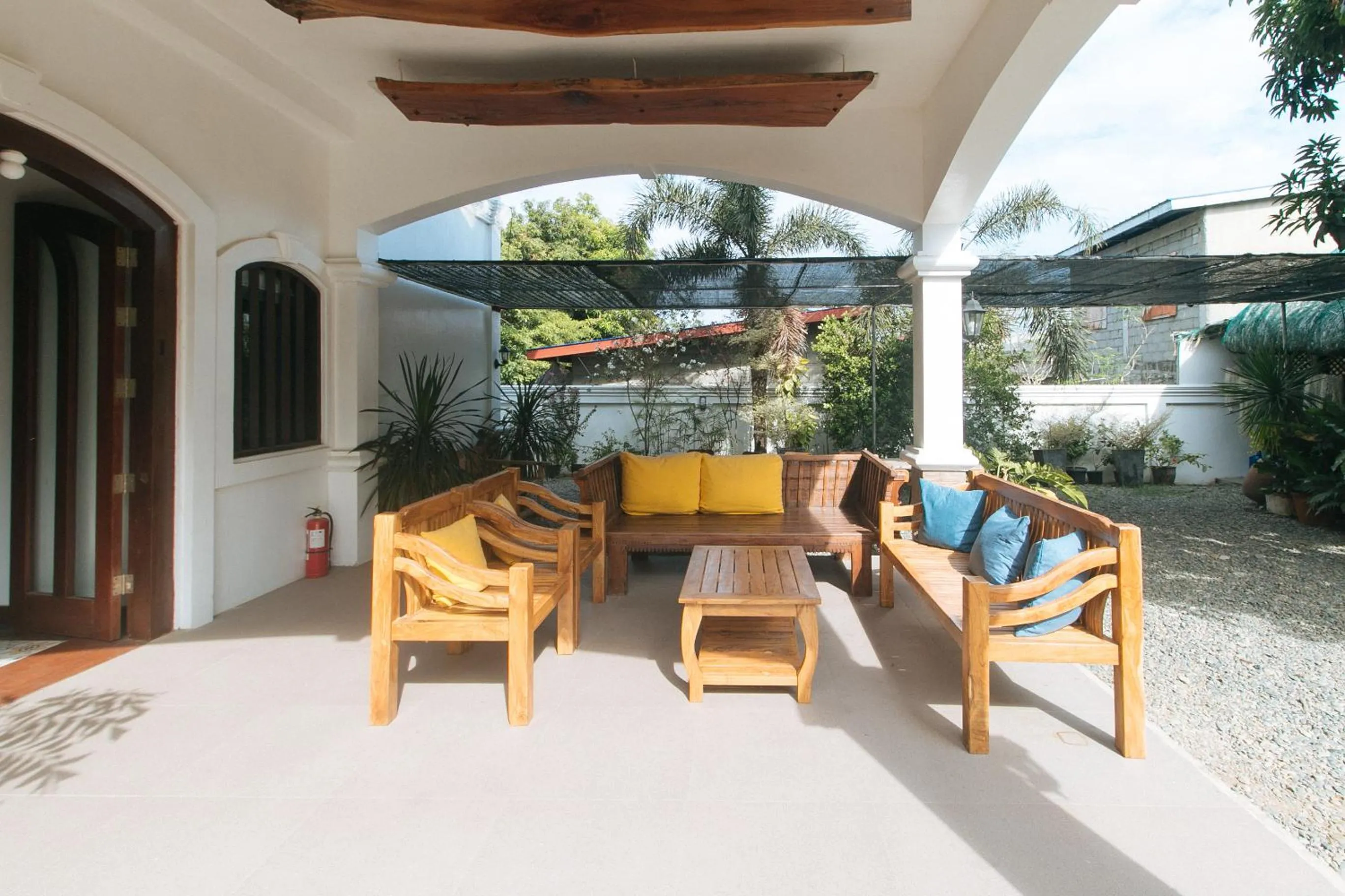 Seating area in RedDoorz at Casa Rafaelle Transient Ilocos Sur