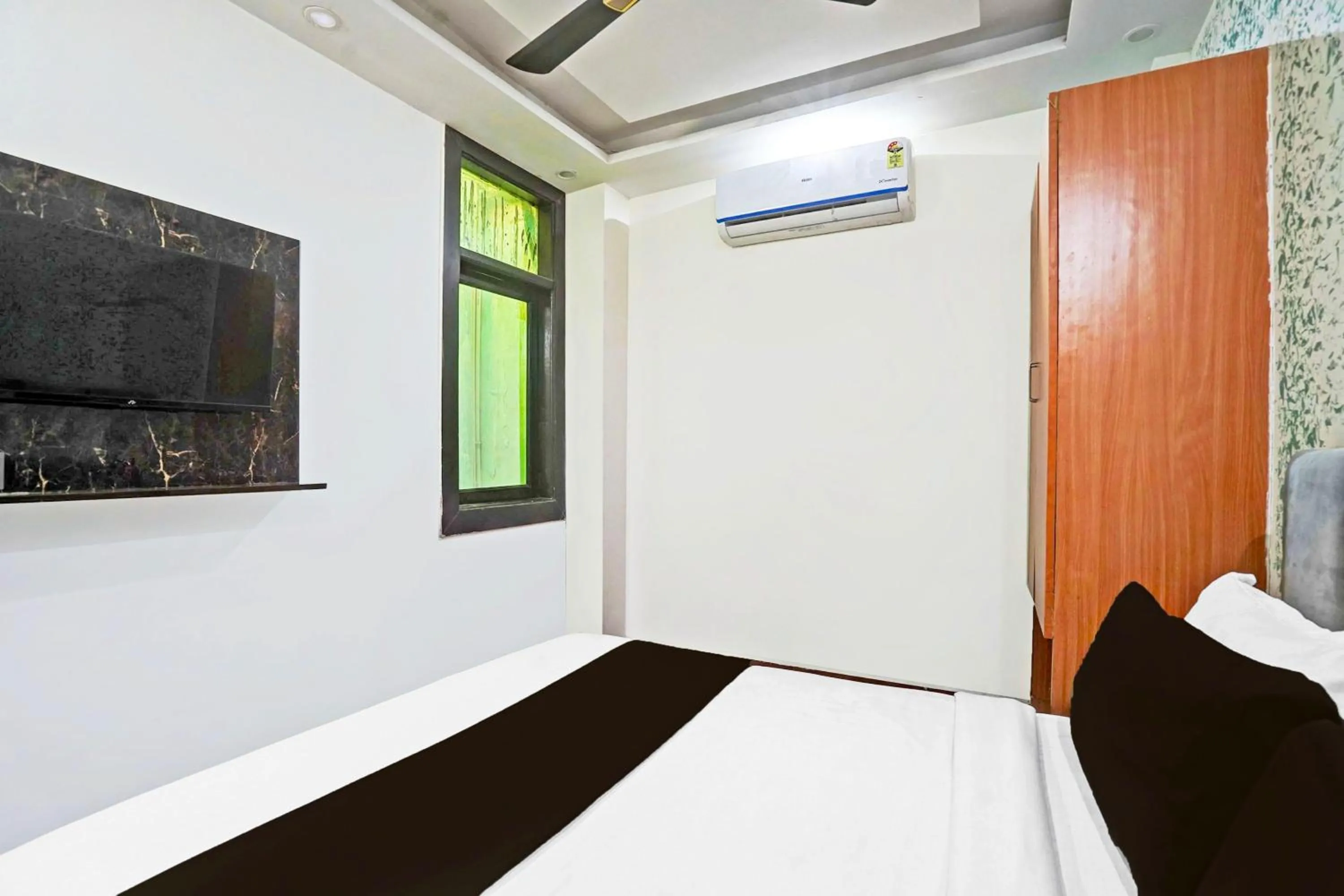 Bedroom, Bed in Super Hotel O Twamev Residency