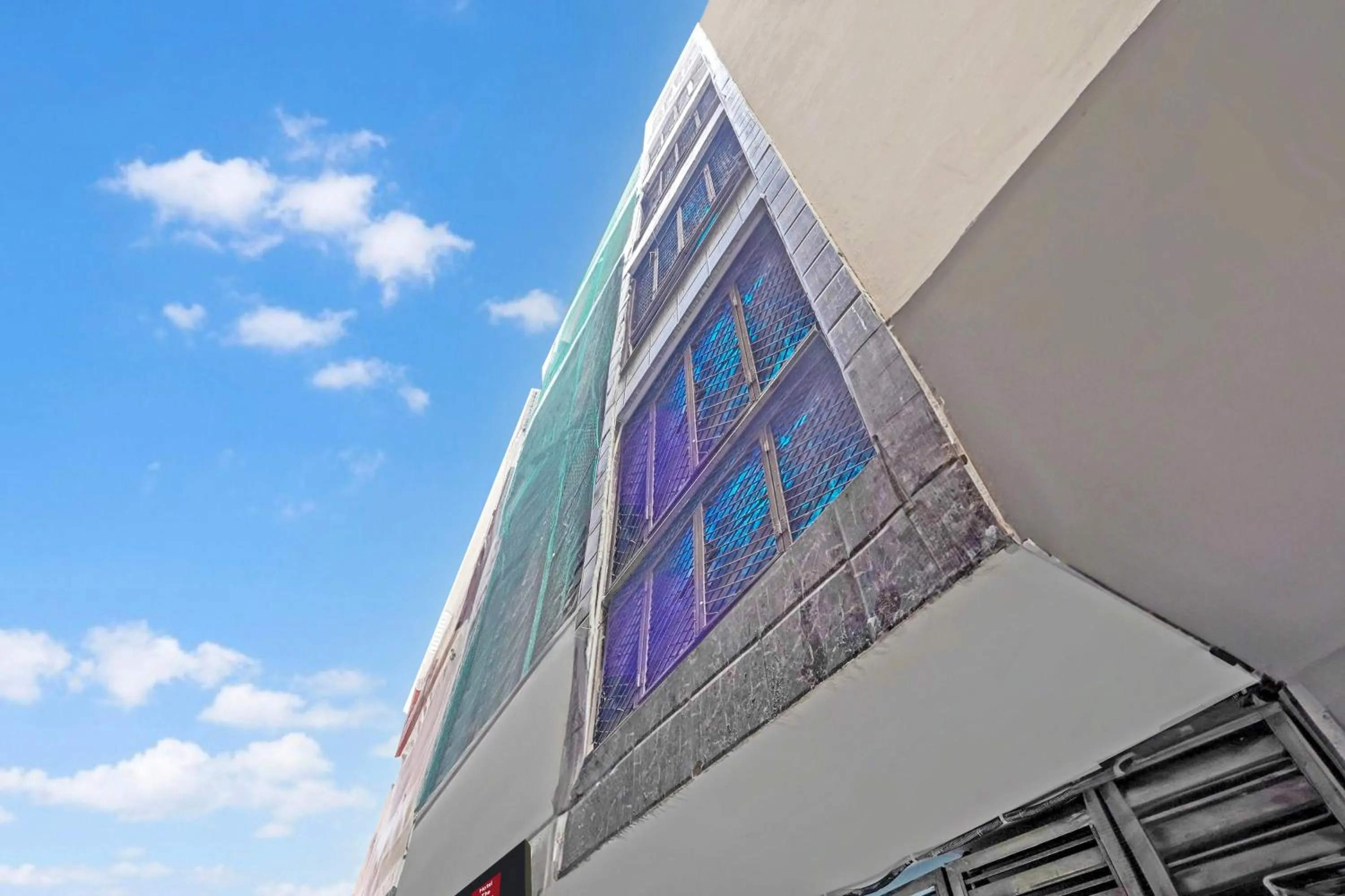 Facade/entrance in Super Hotel O Twamev Residency