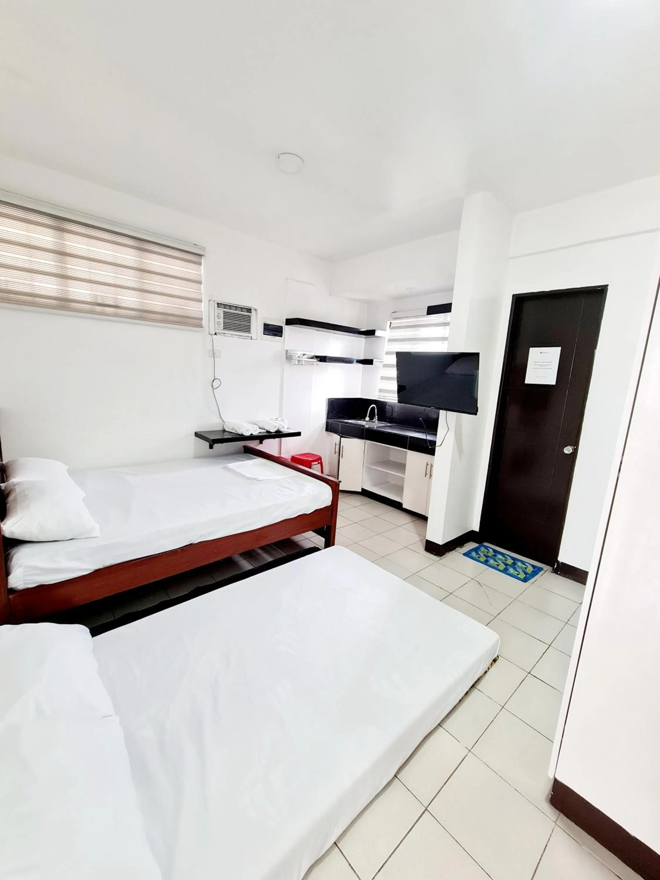 Bed in Dasma Lofts Hotel near Dela Salle Dasma