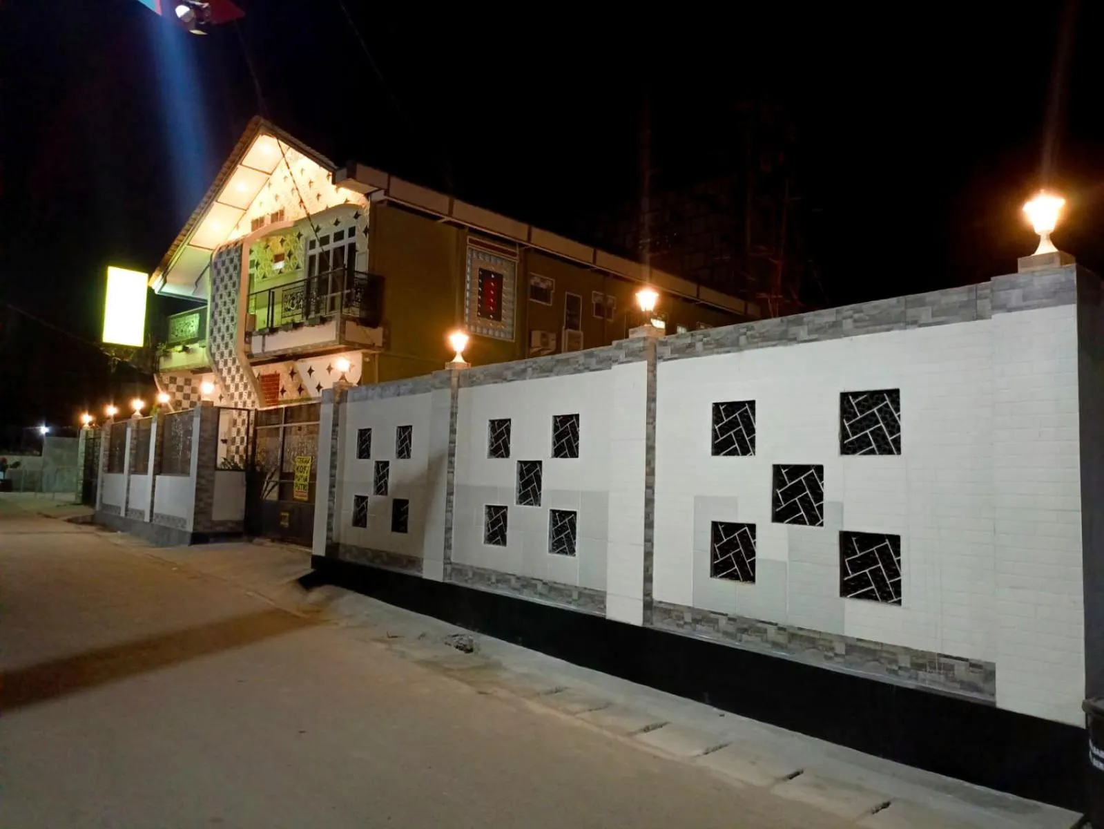 Text overlay in JN Kost Eksklusif Kost Purwokerto