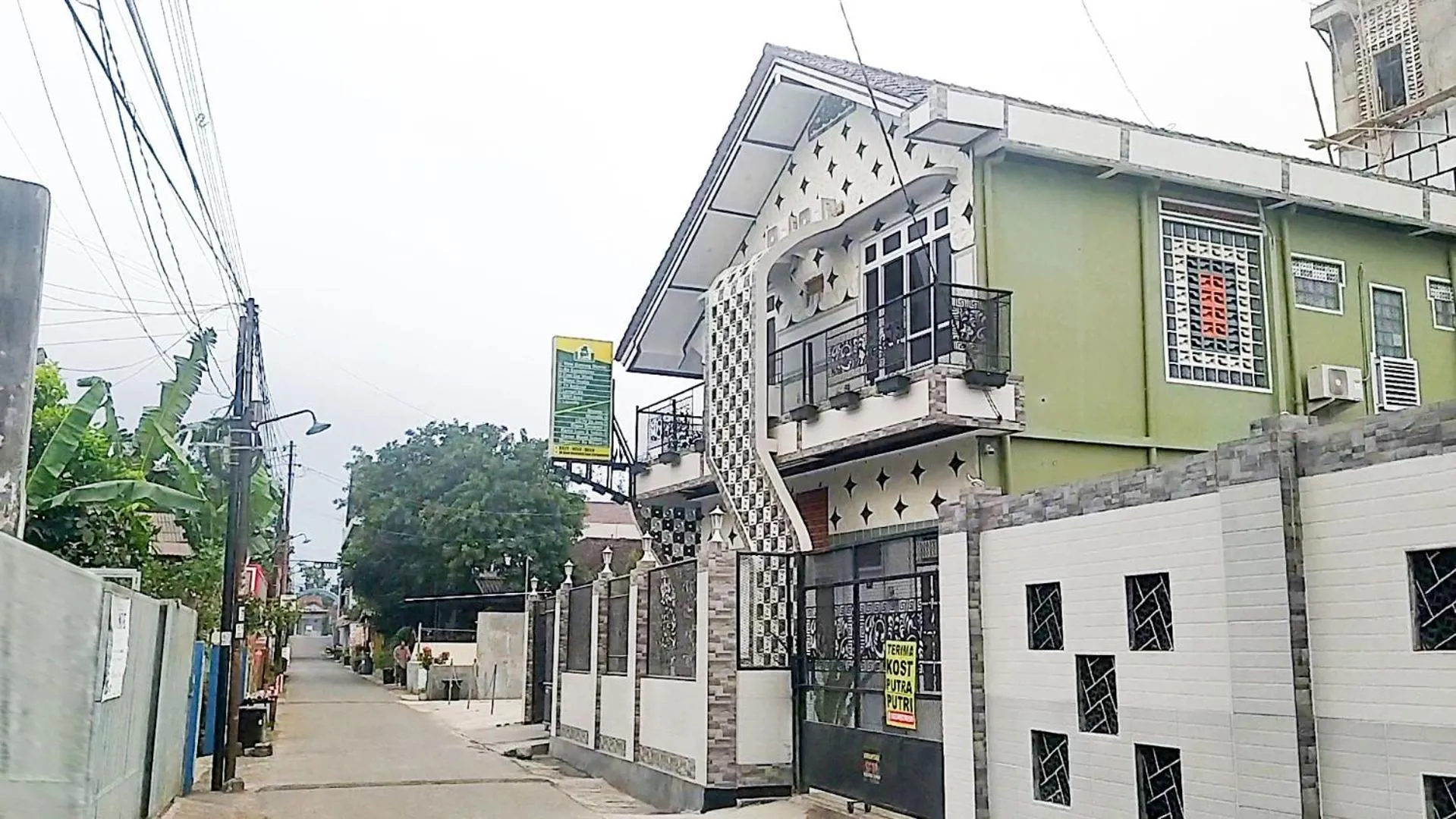 Text overlay in JN Kost Eksklusif Kost Purwokerto