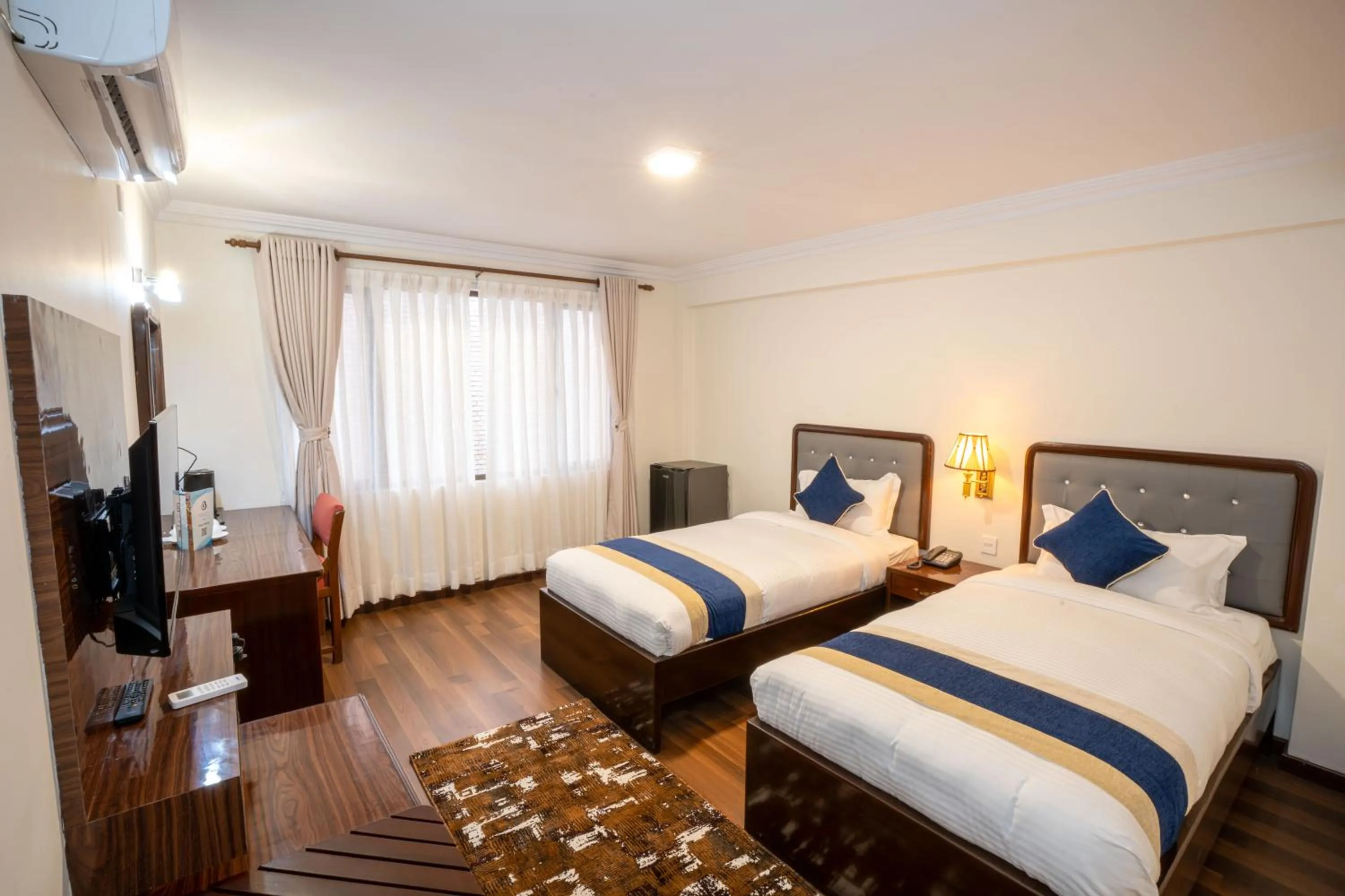 Photo of the whole room, Bed in Kathmandu Business Hotel